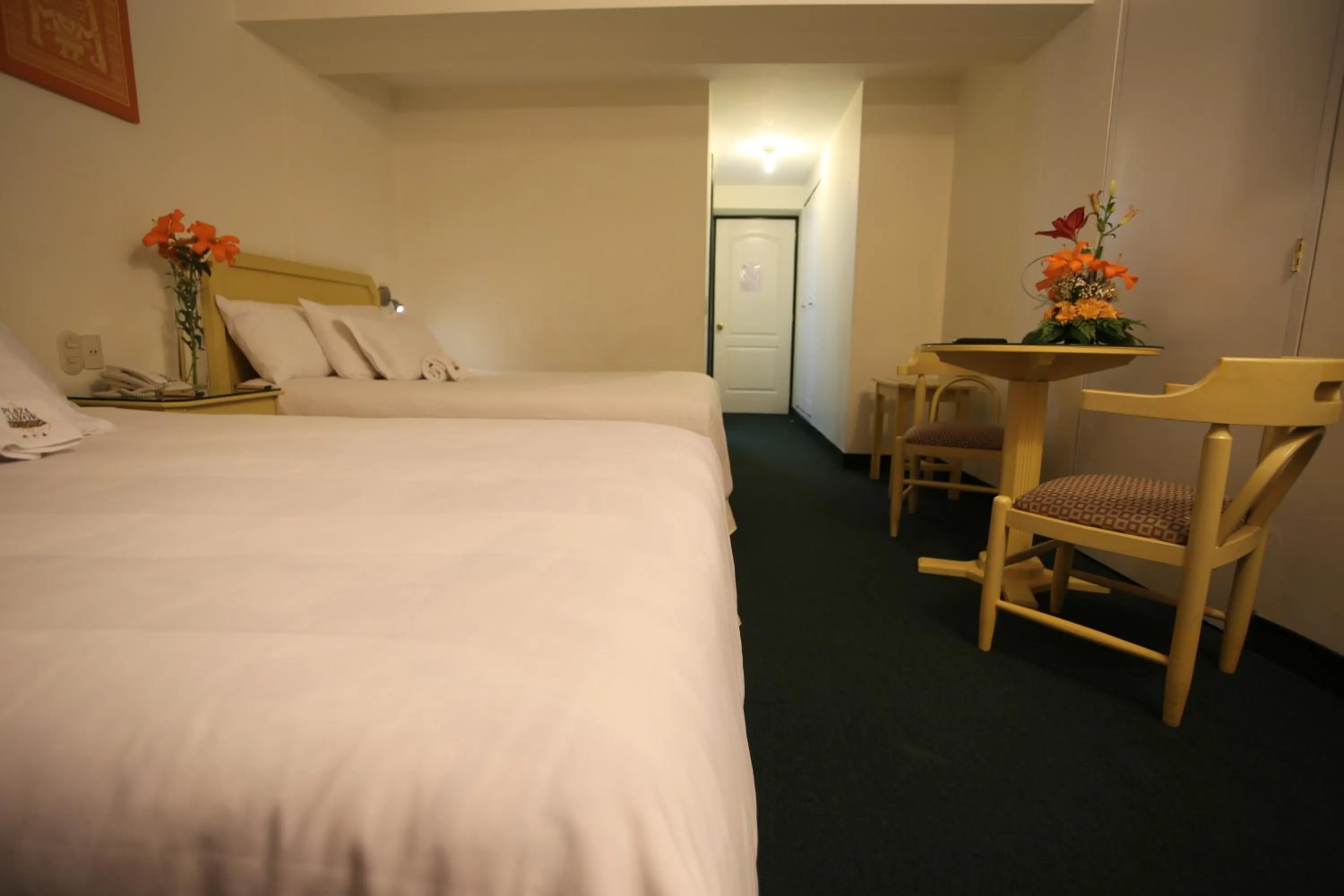 Bed in Plaza Mayor Hotel