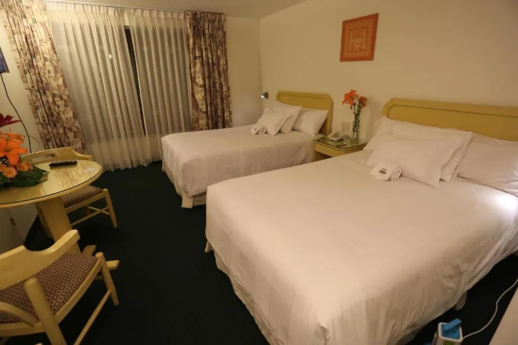 Bed in Plaza Mayor Hotel