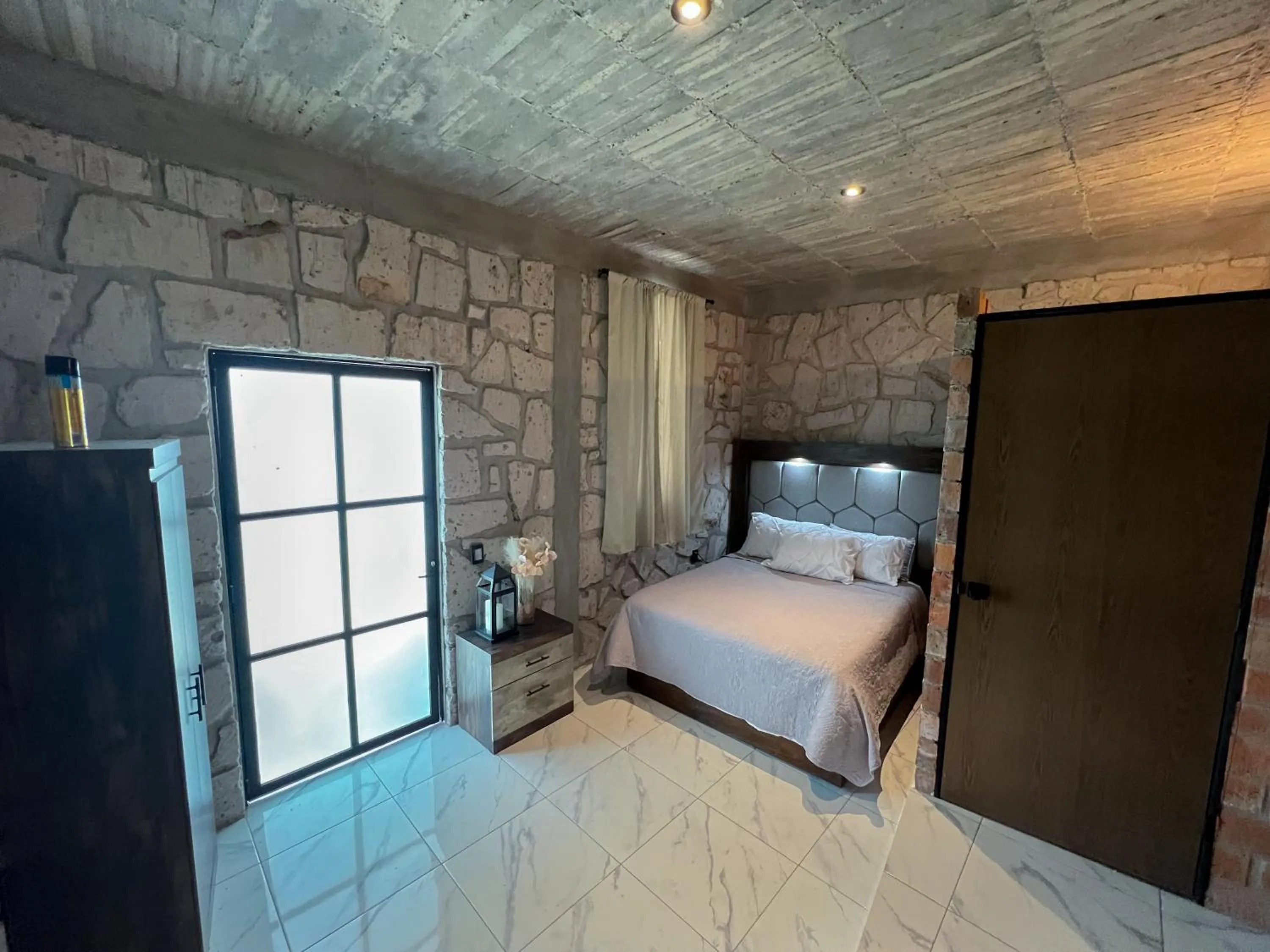 Bed in Dos Aguas Hotel Boutique