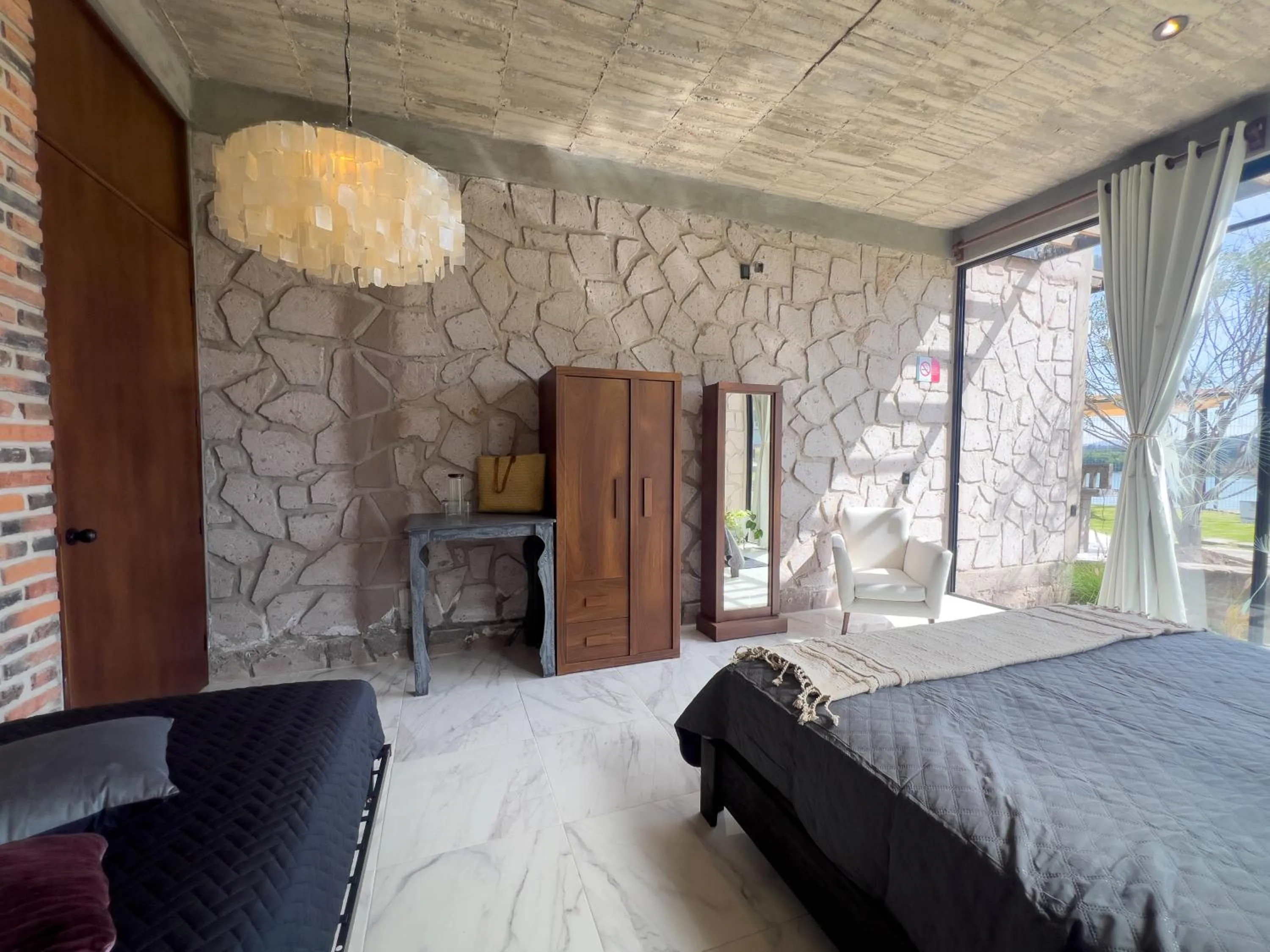 Photo of the whole room, Bed in Dos Aguas Hotel Boutique