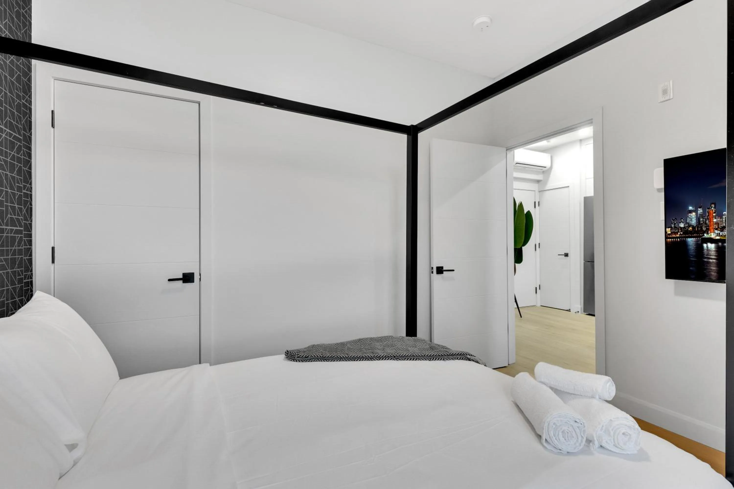 Bed in Deluxe Suites Downtown Montreal