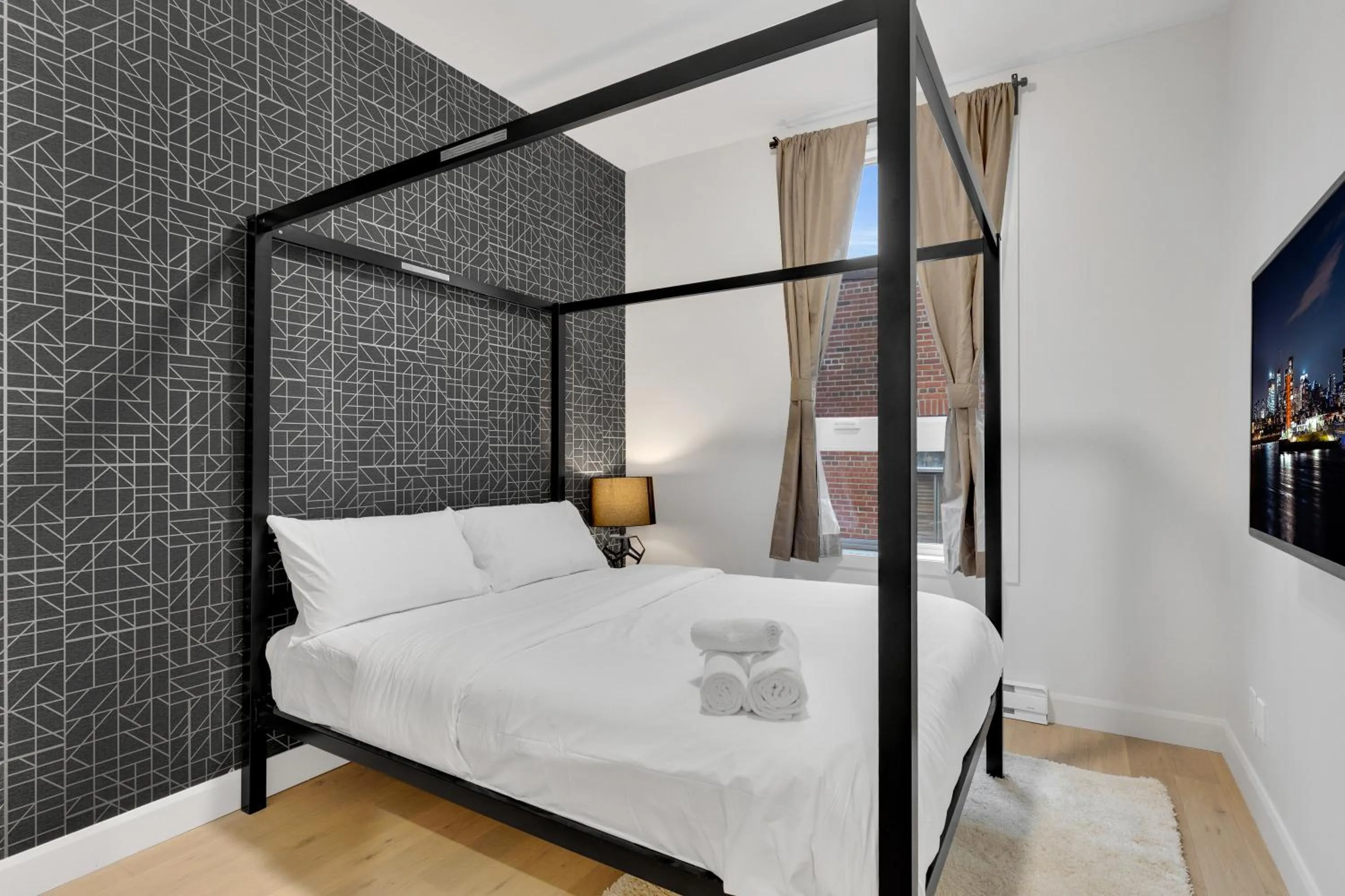 Bed in Deluxe Suites Downtown Montreal