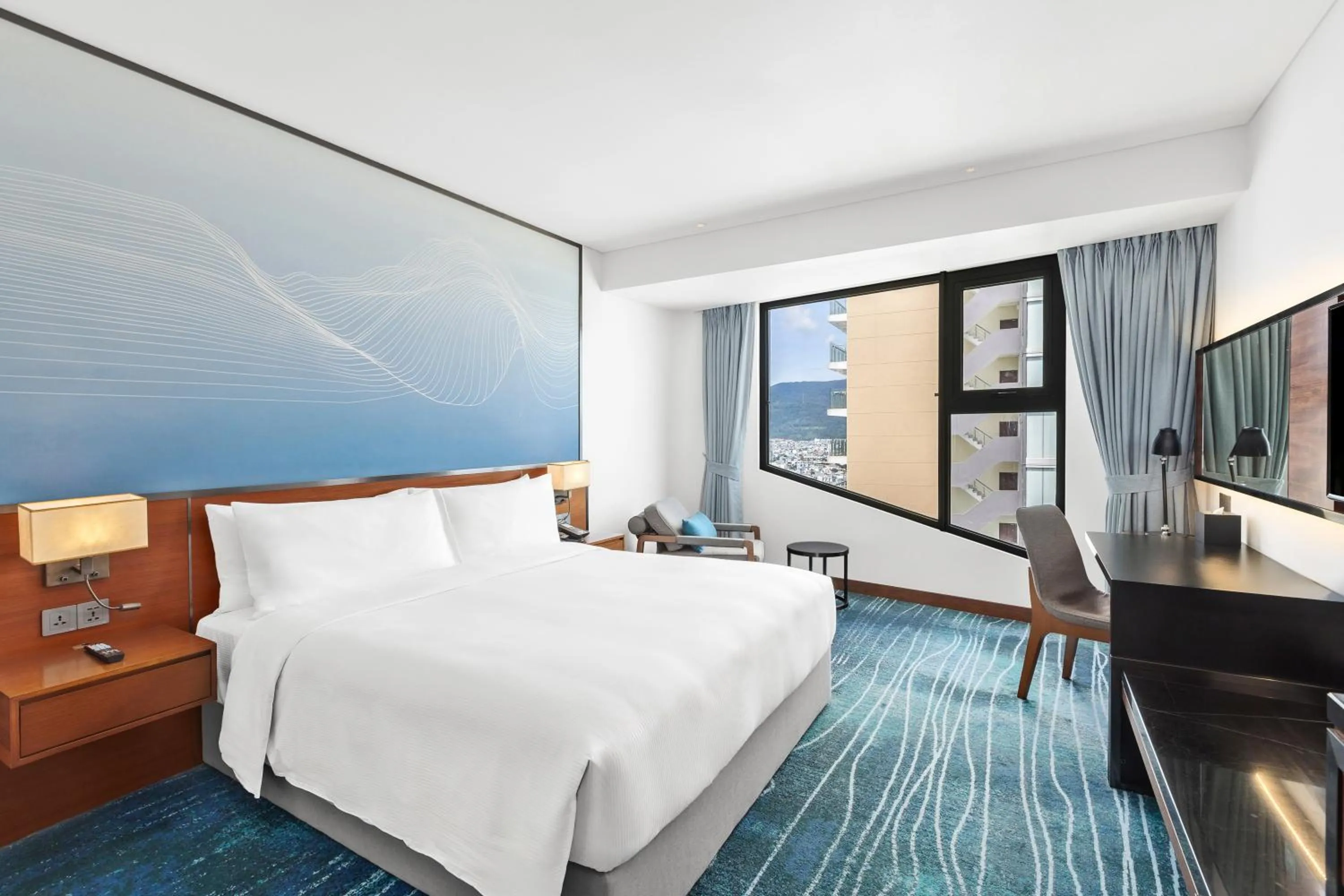 Photo of the whole room, Bed in Hilton Garden Inn Da Nang