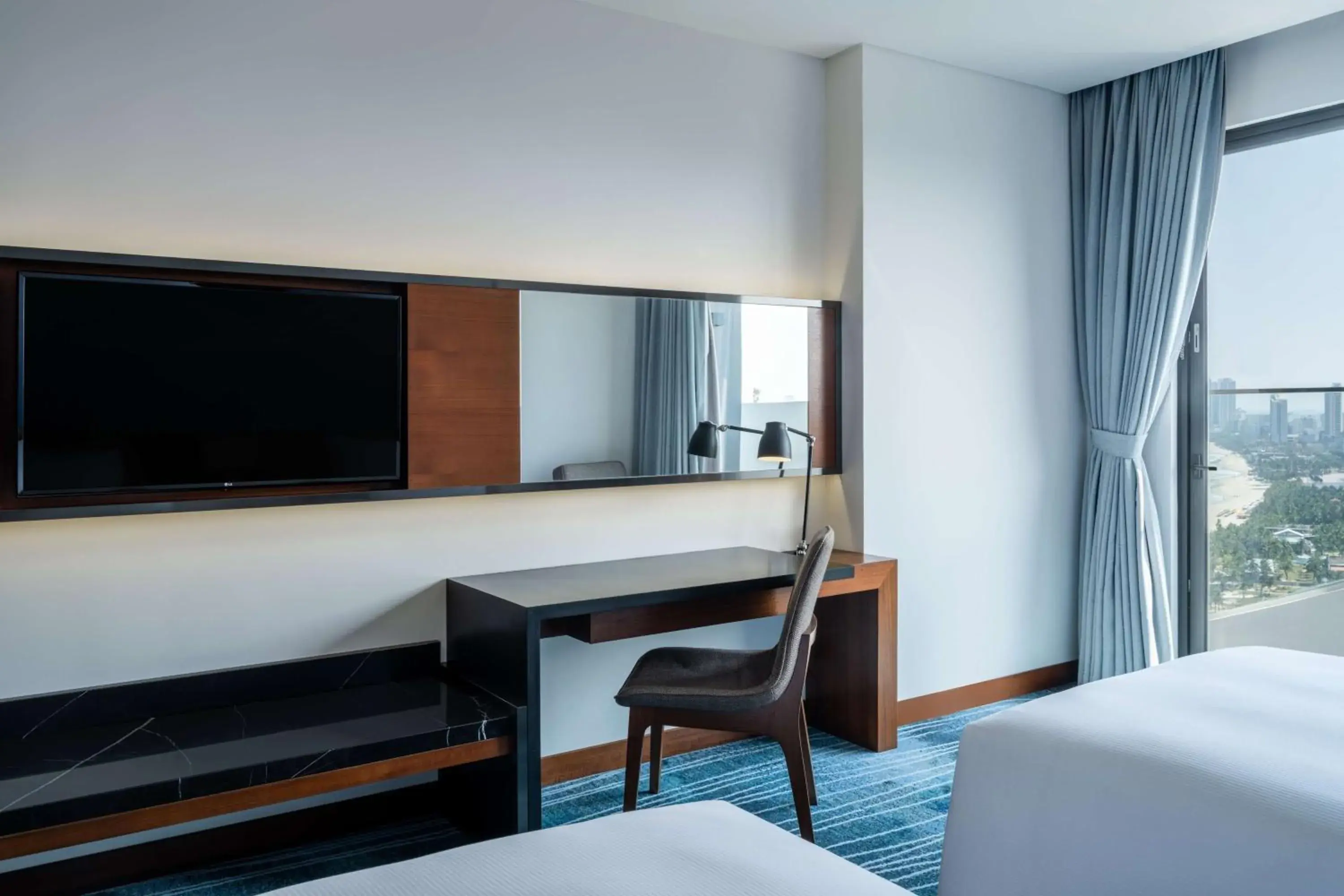 Twin Guest Room with Balcony in Hilton Garden Inn Da Nang Twin Guest Room with Balcony in Hilton Garden Inn Da Nang