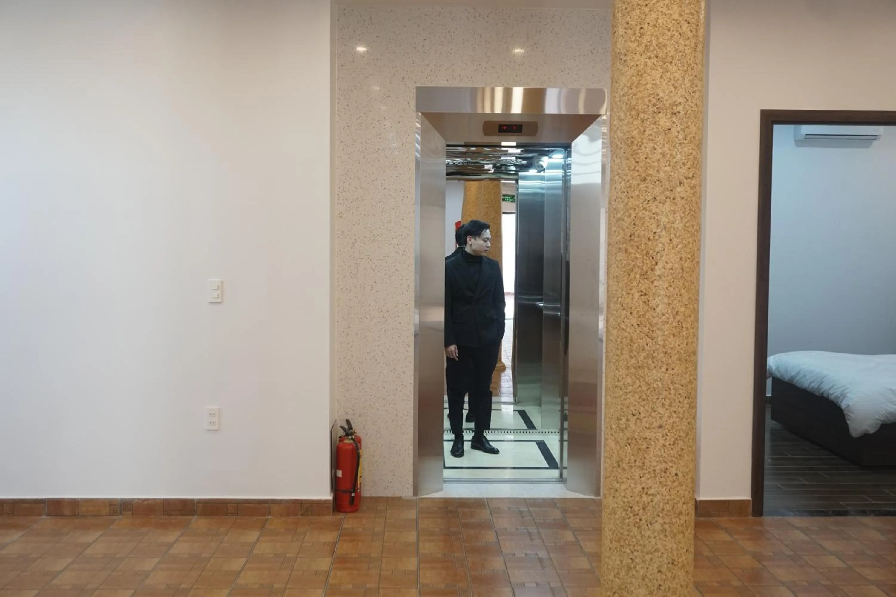 elevator, Bed in Adal Motel