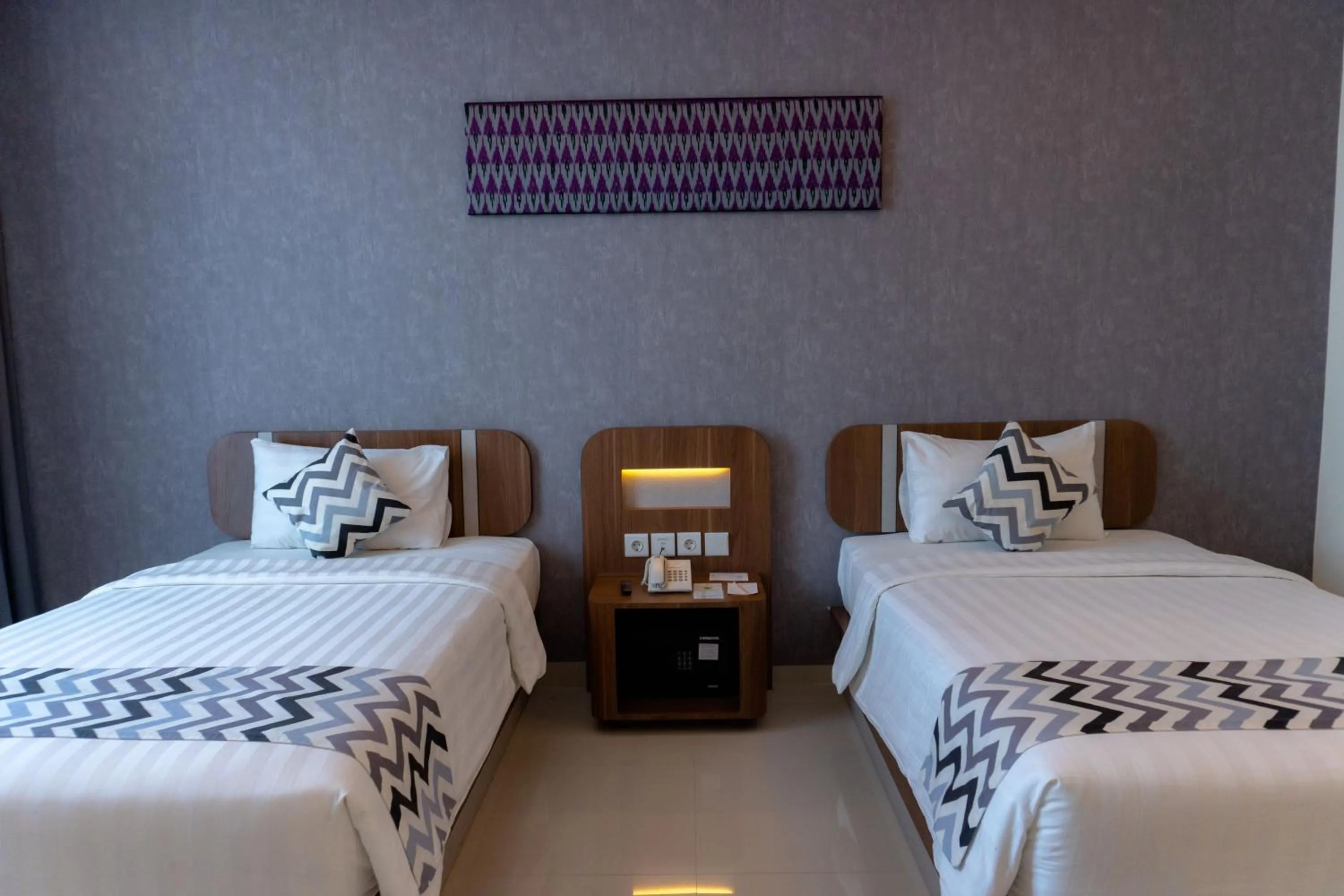 Bed in UNHAS HOTEL & CONVENTION