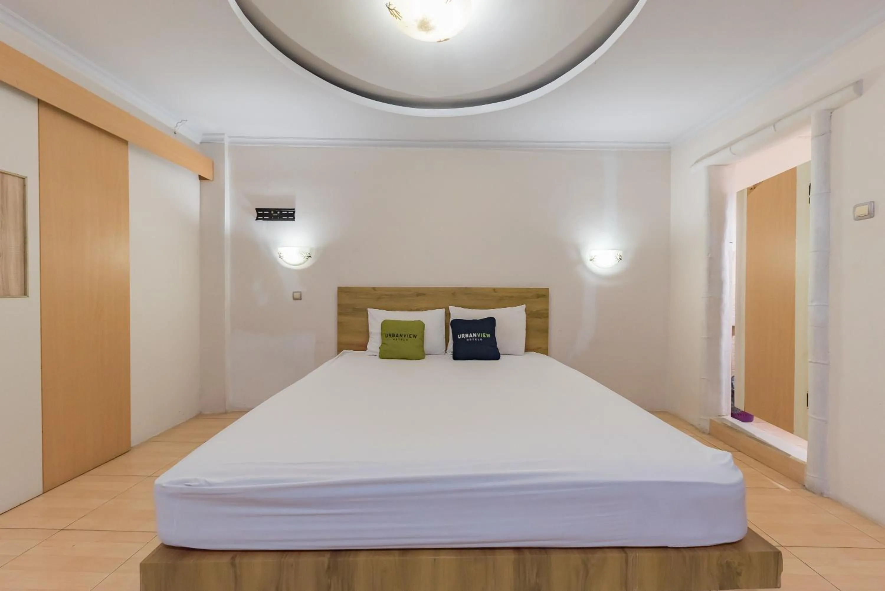 Bed in Urbanview Hotel Anggrek Puncak by RedDoorz