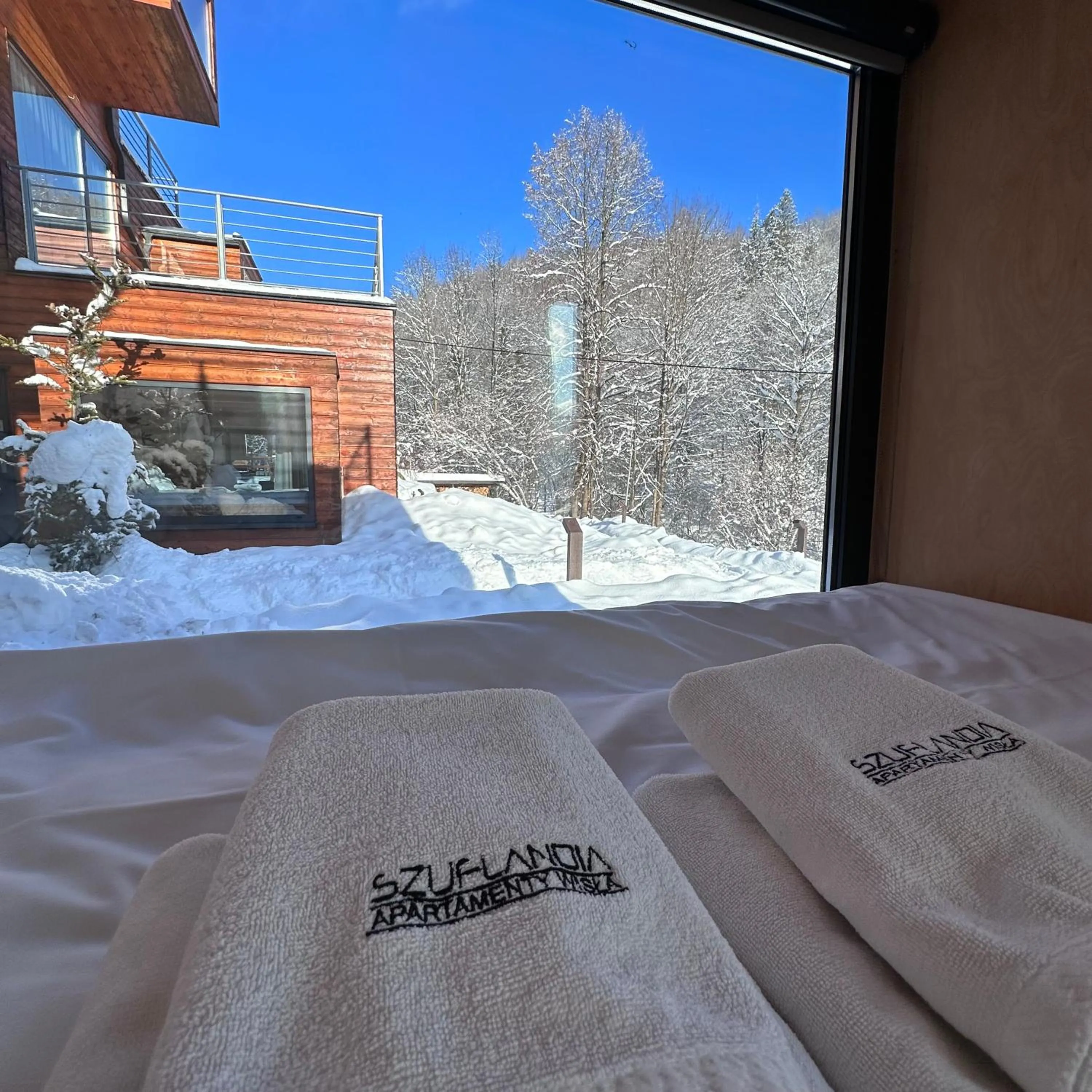 Bed in Apartamenty Szuflandia z sauną, jacuzzi, przy stoku narciarskim