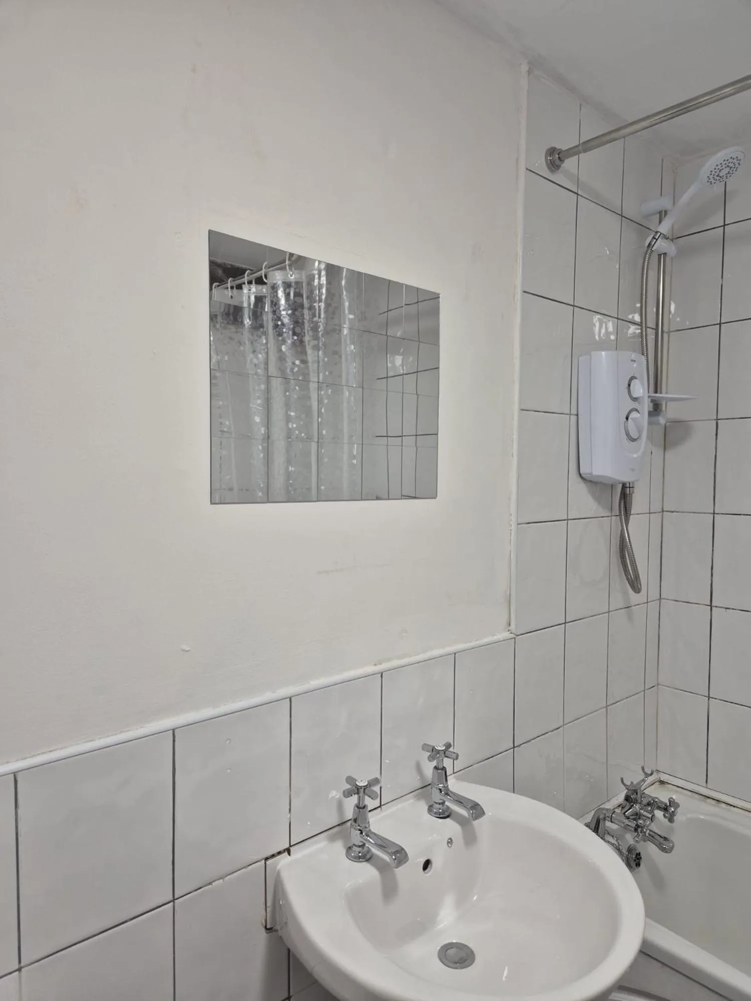 Shower in Rainford Gardens by UStay Aparthotels