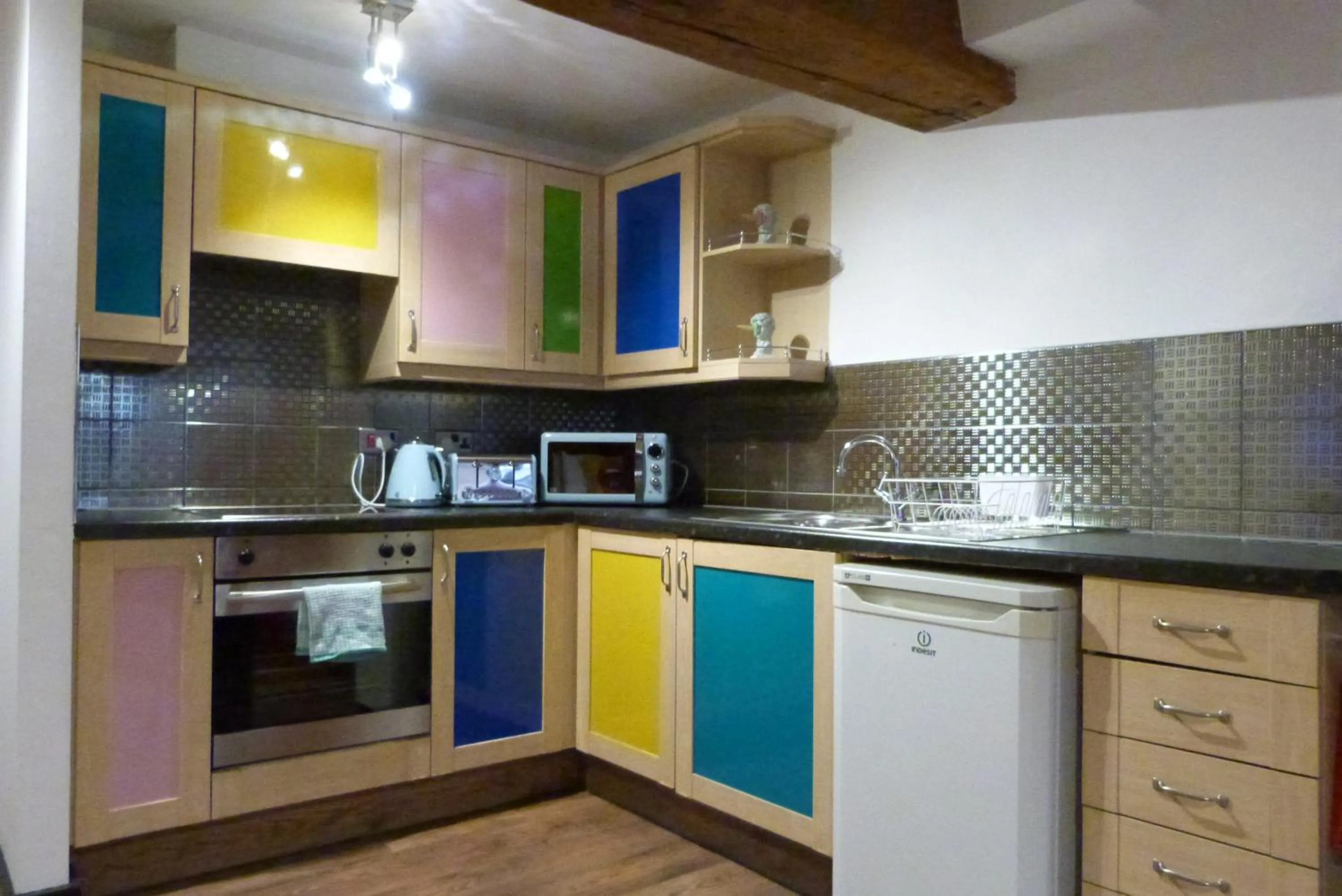 Kitchen or kitchenette in Rainford Gardens by UStay Aparthotels