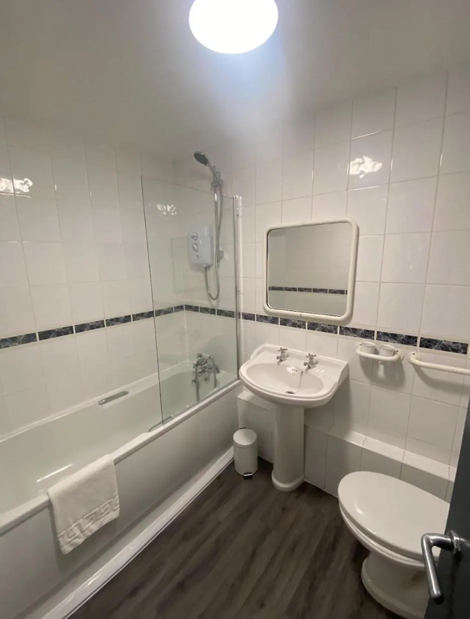 Shower in Rainford Gardens by UStay Aparthotels