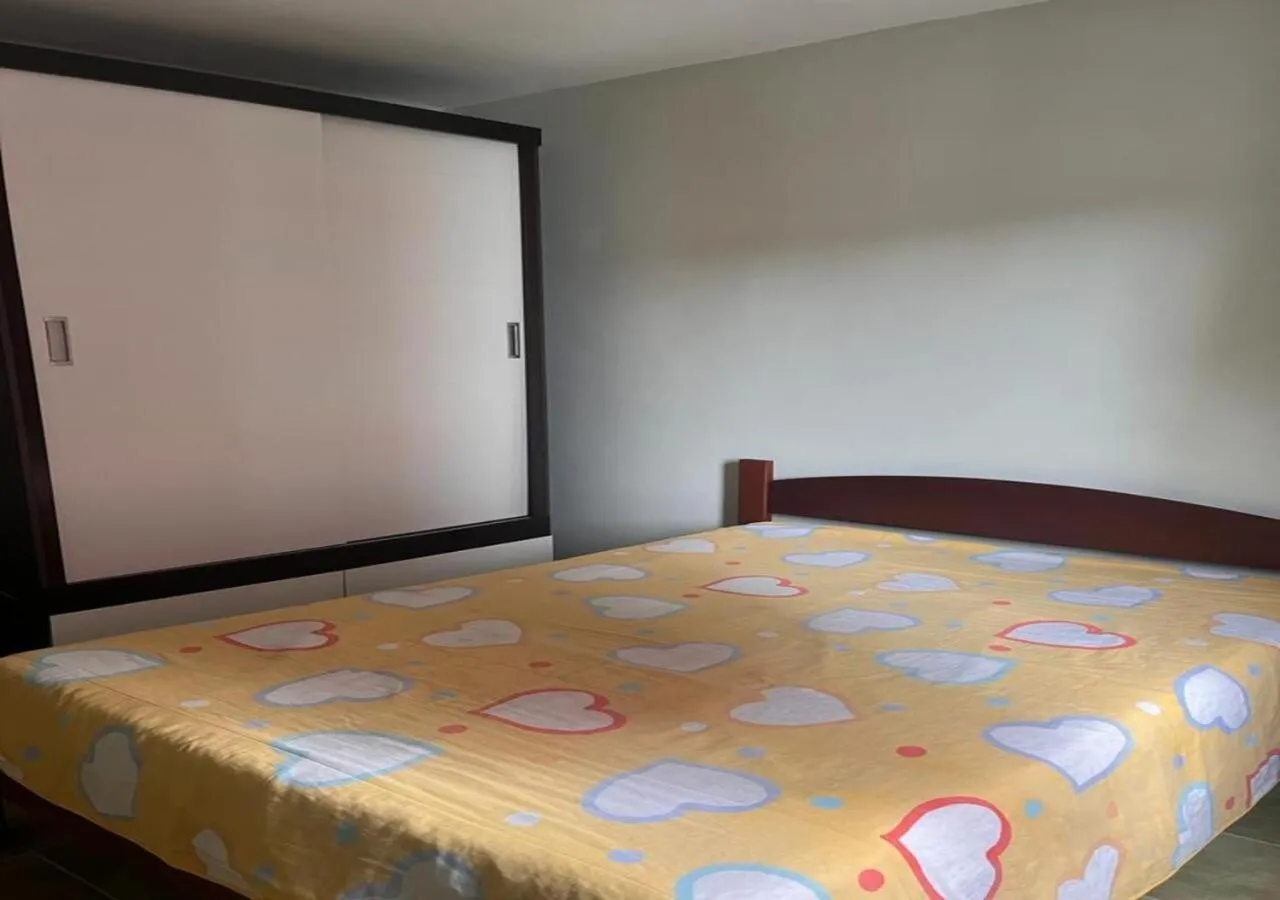 Bedroom, Bed in Apartamento Vila Tupi Praia Grande