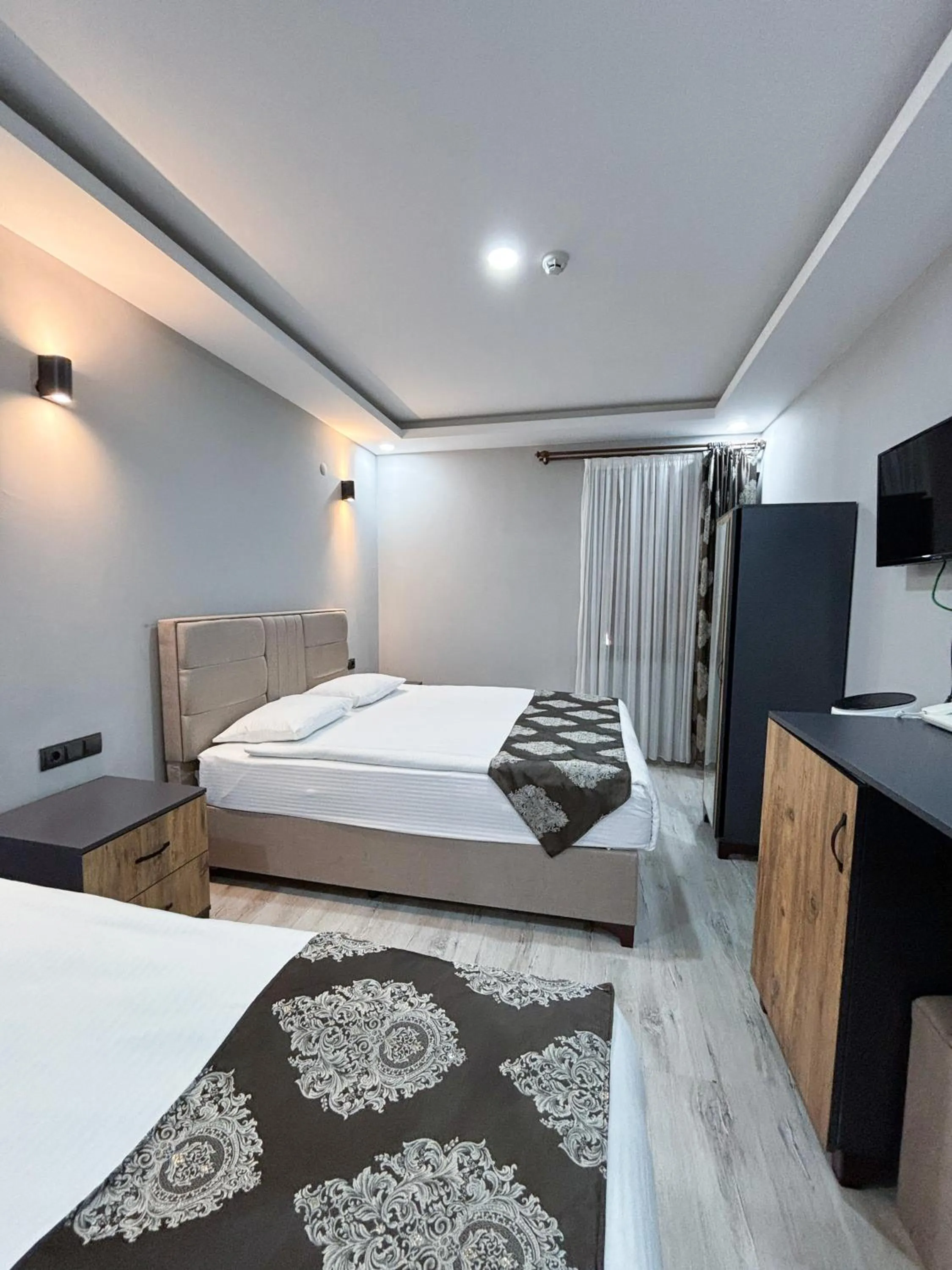 Bed in Whitestone Hotel