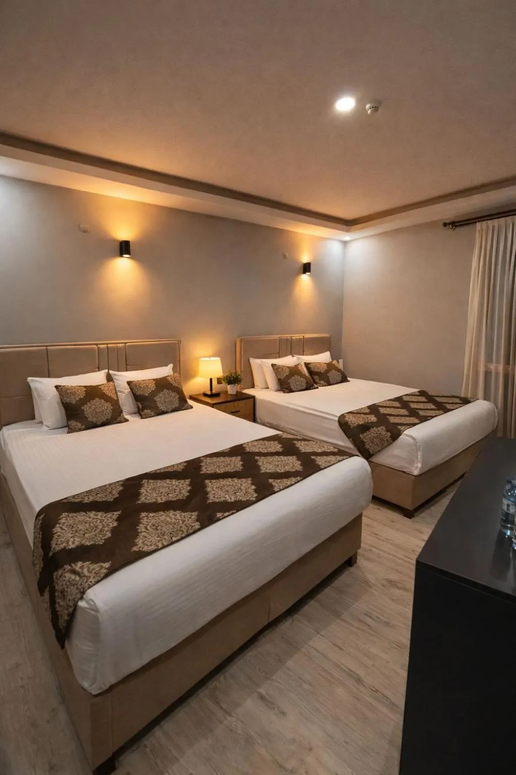 Bed in Whitestone Hotel