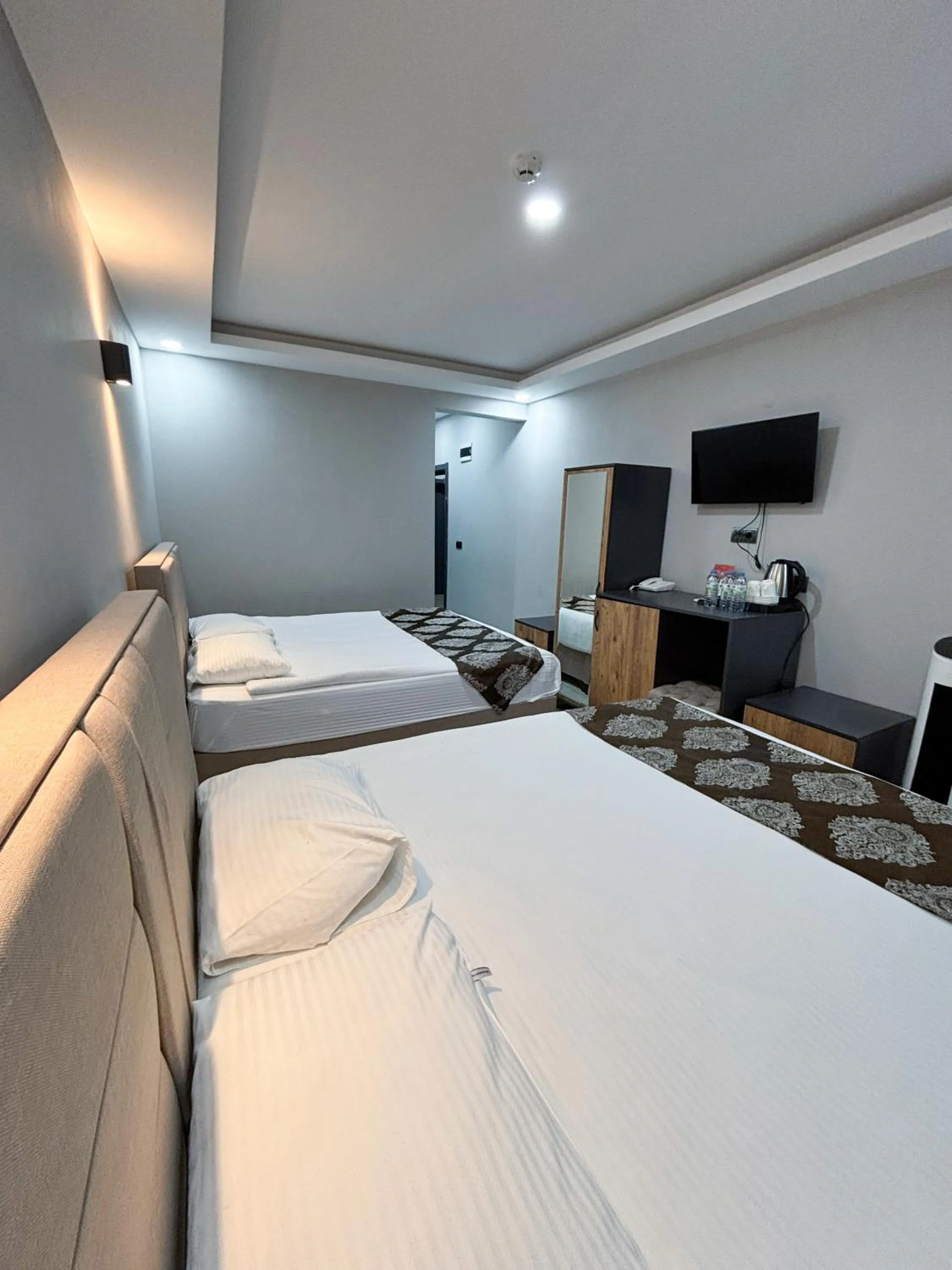 Bed in Whitestone Hotel