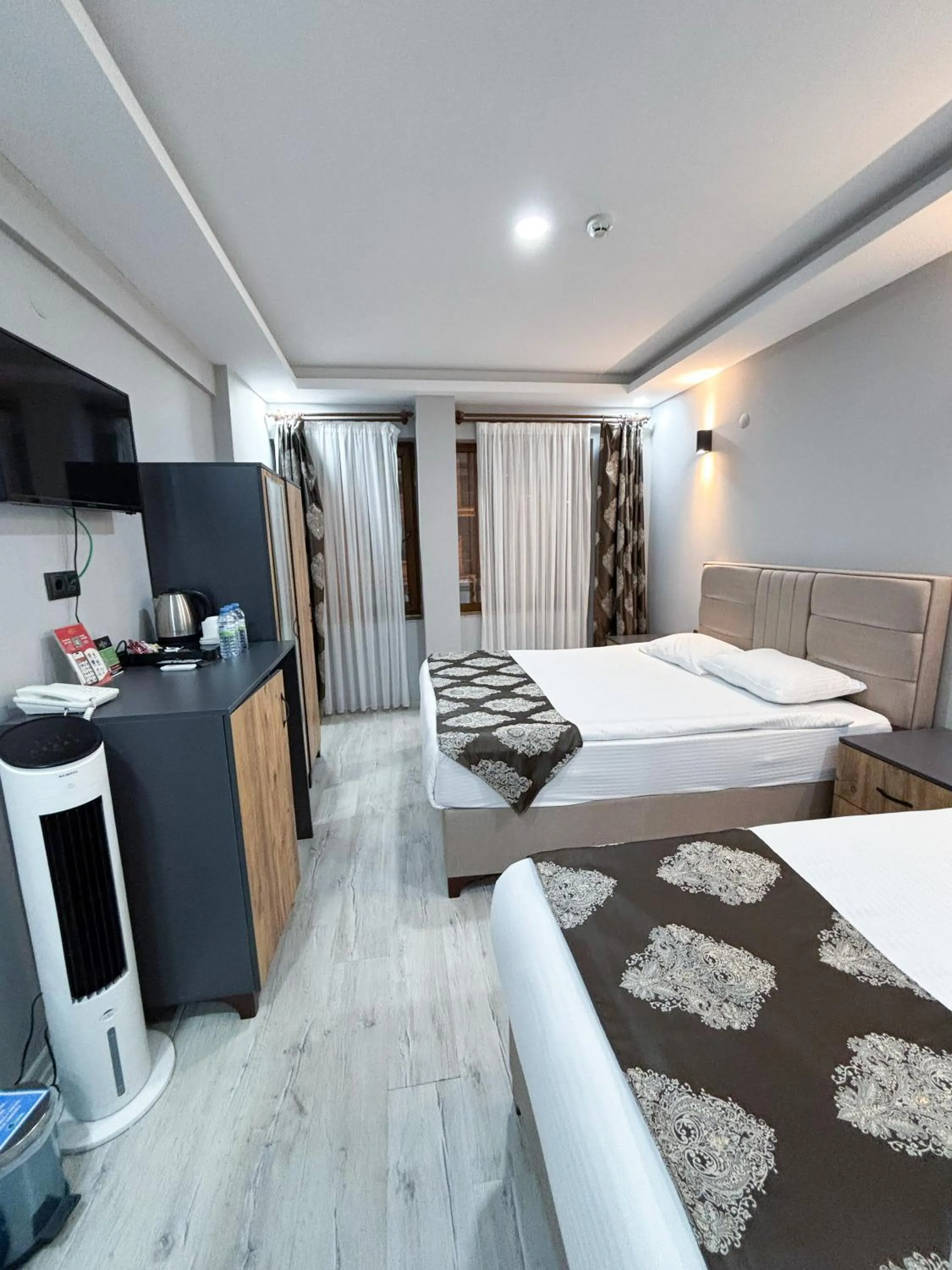 Bed in Whitestone Hotel