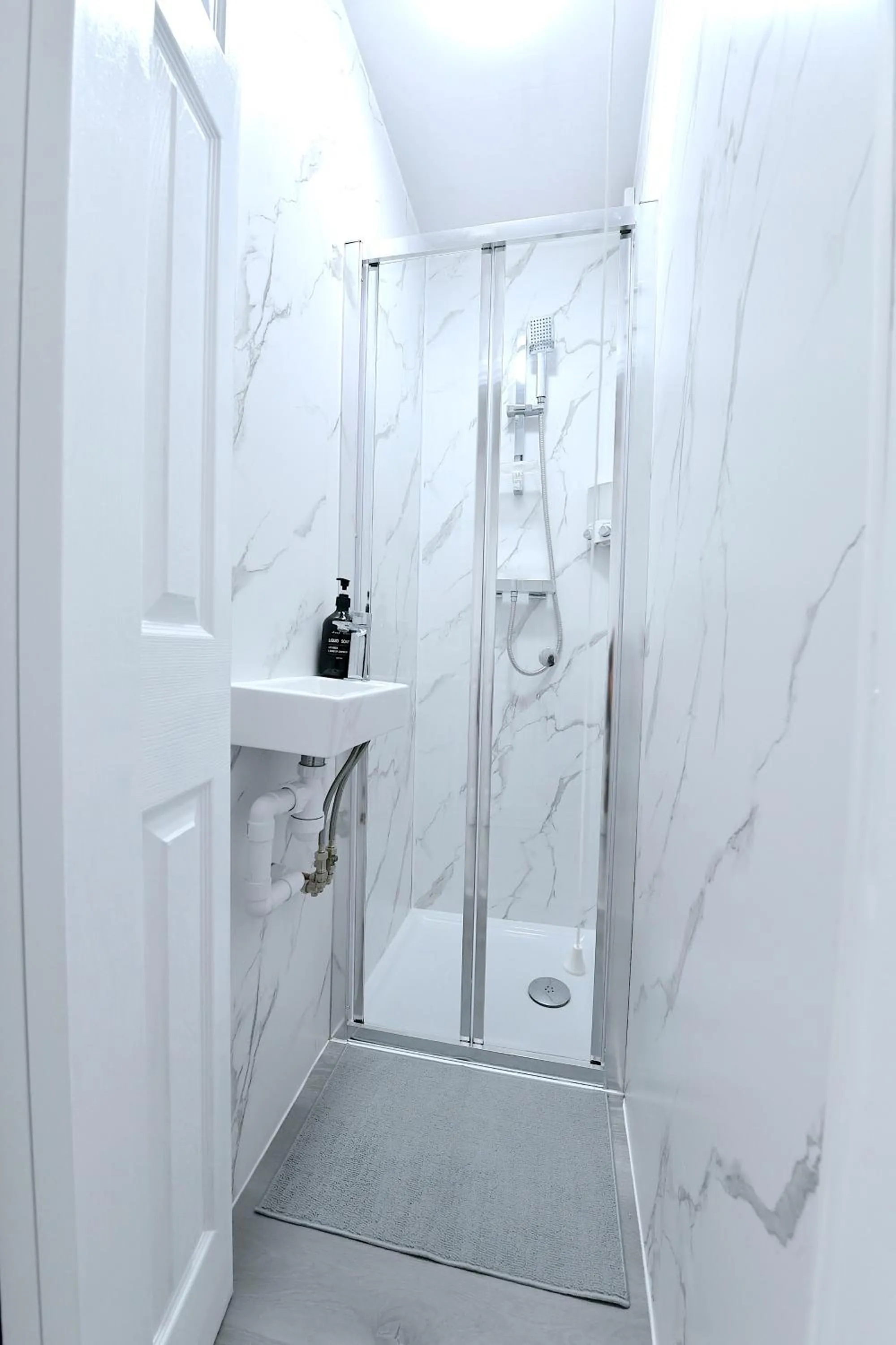 Shower in Stylish Studios by Luxestays Fulham