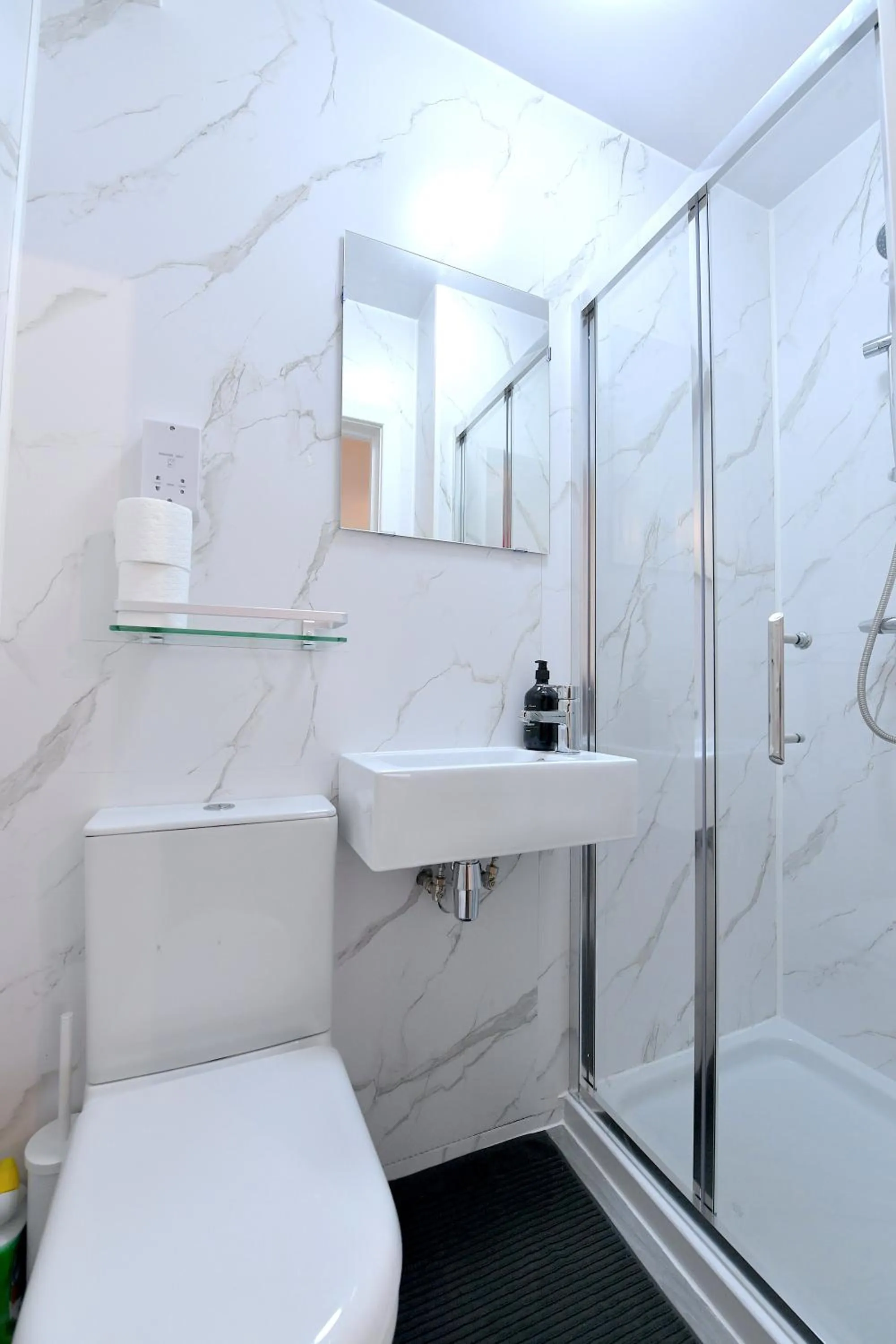Shower in Stylish Studios by Luxestays Fulham