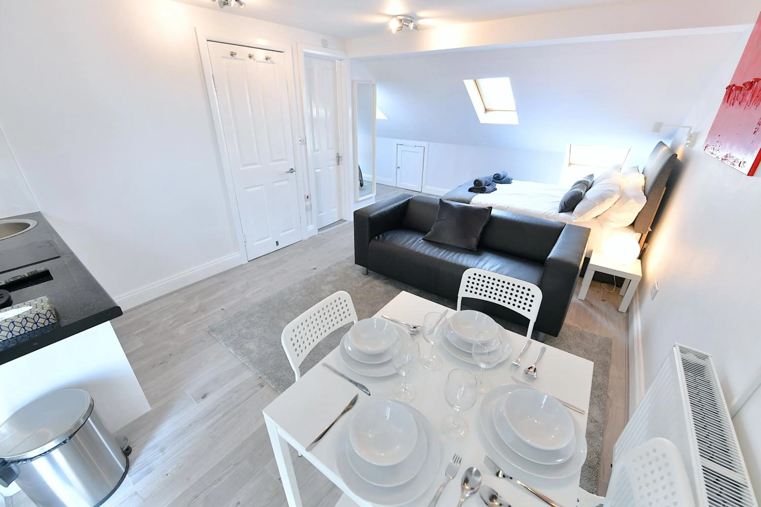Seating area in Stylish Studios by Luxestays Fulham