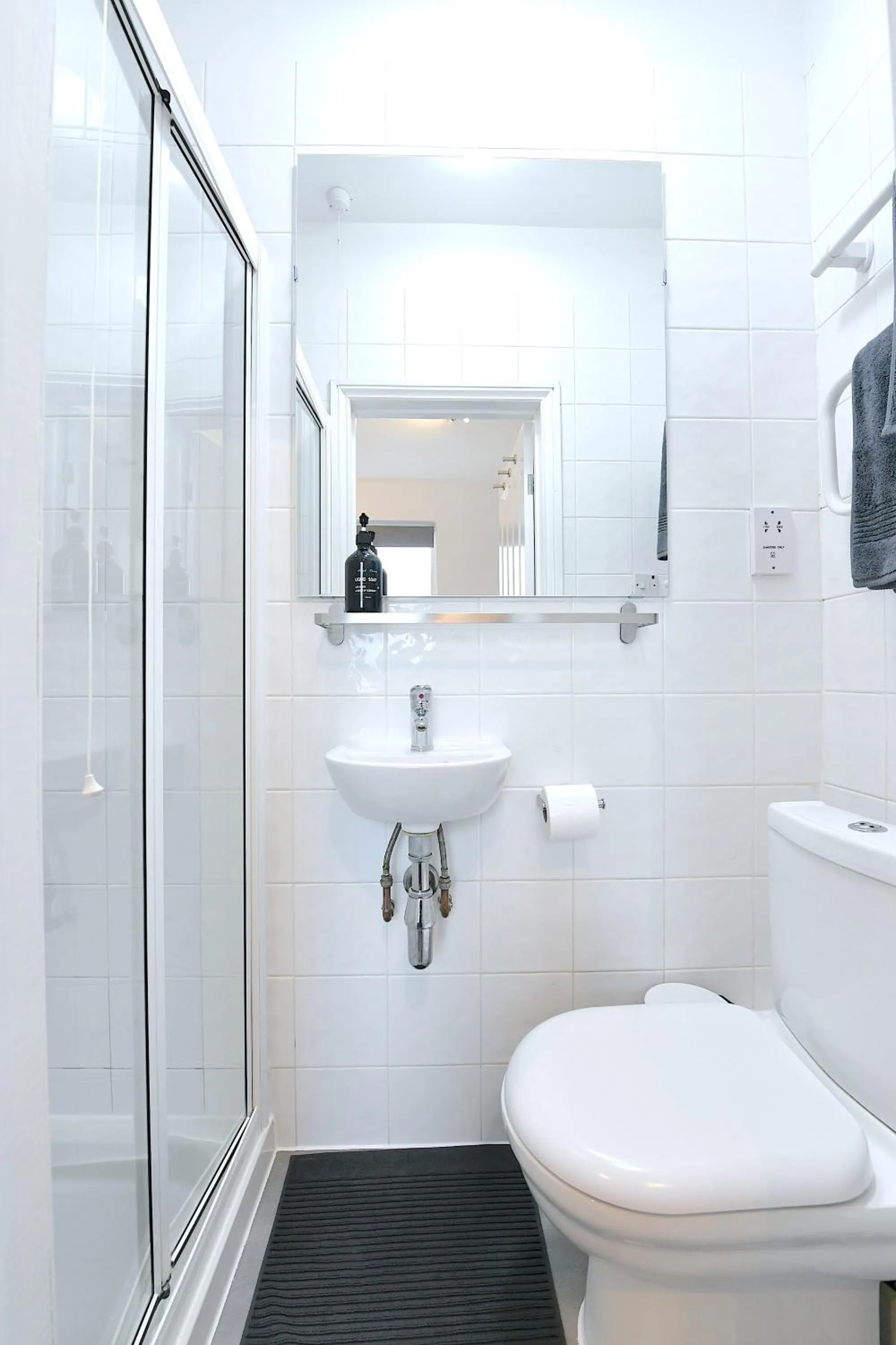 Shower in Stylish Studios by Luxestays Fulham