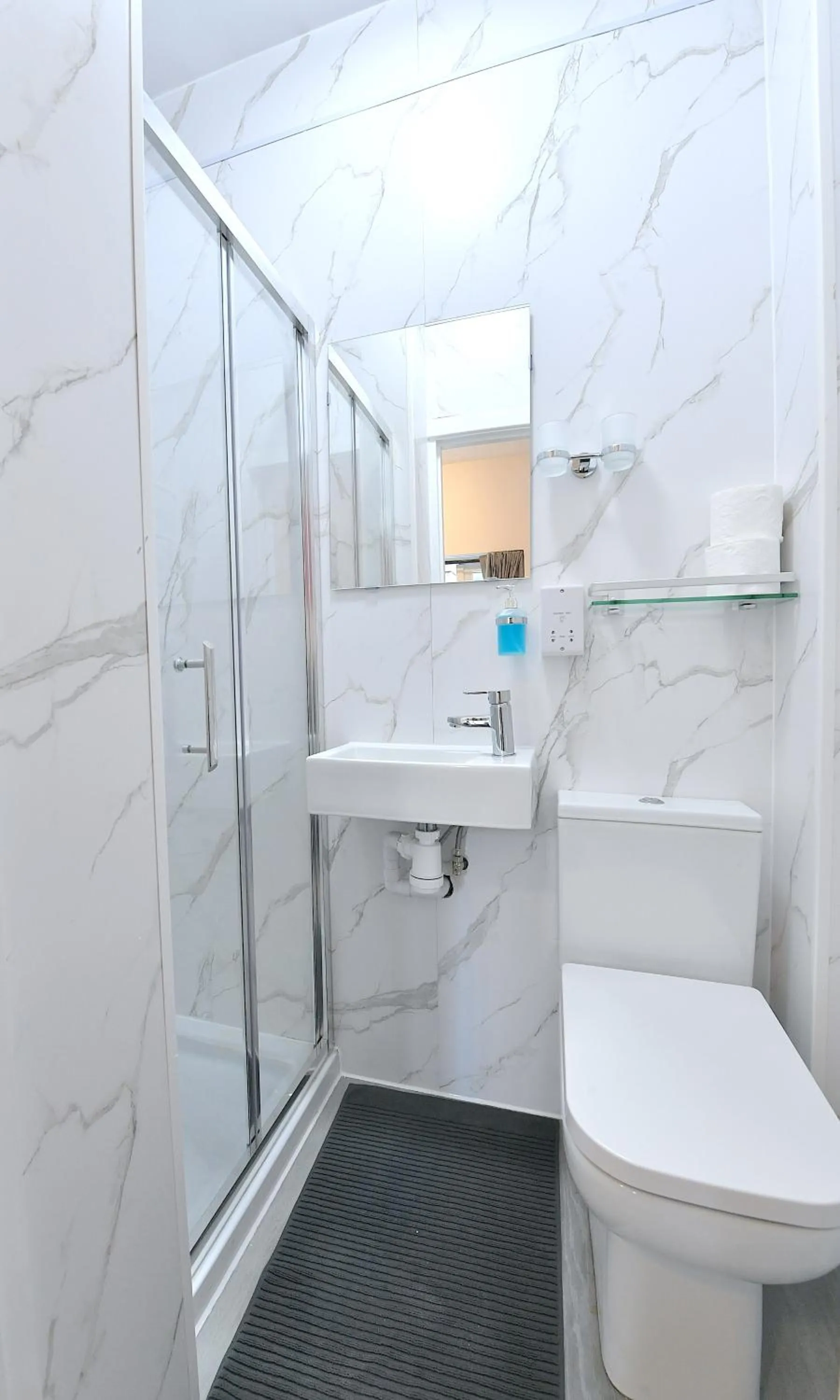 Shower in Stylish Studios by Luxestays Fulham