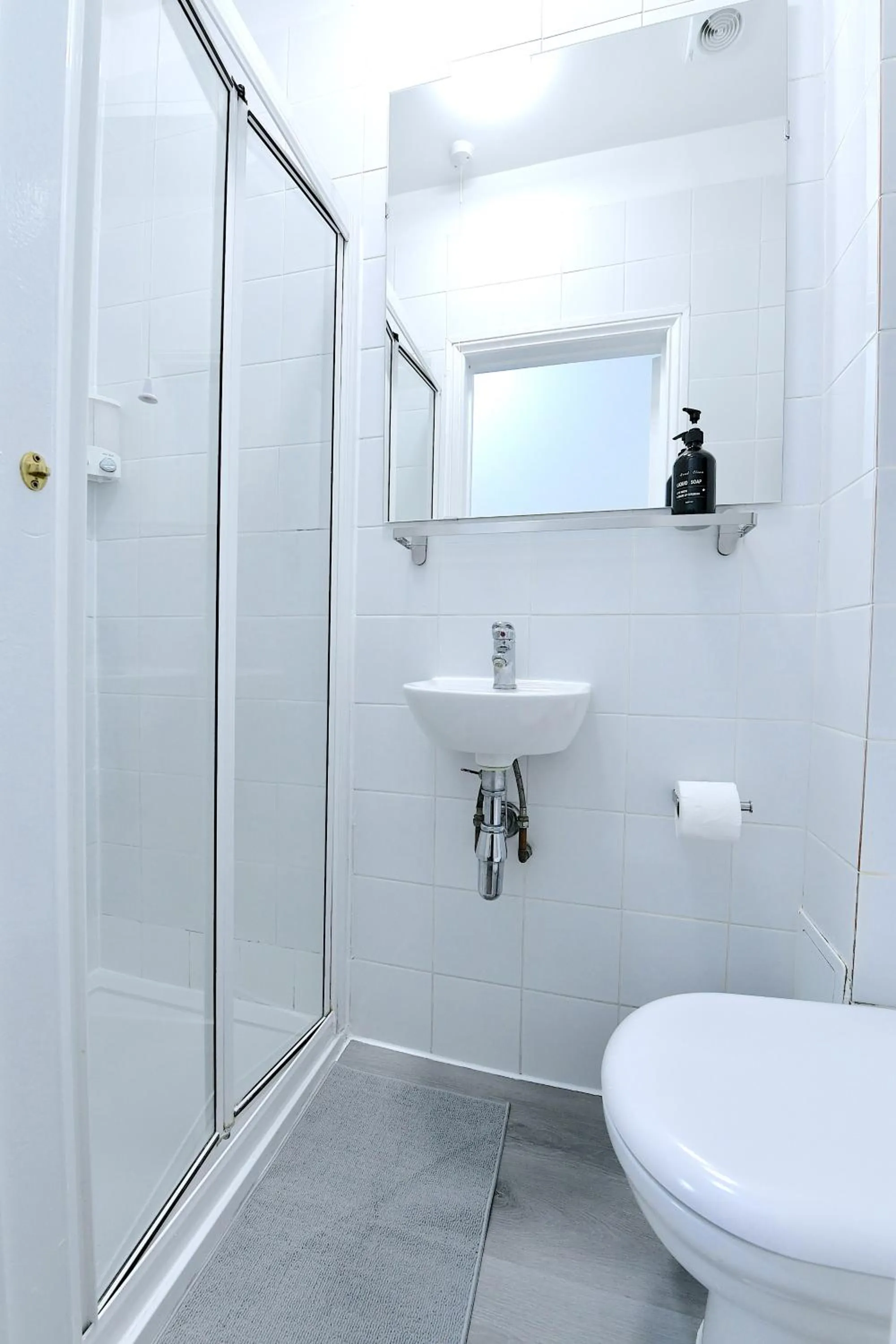 Shower in Stylish Studios by Luxestays Fulham