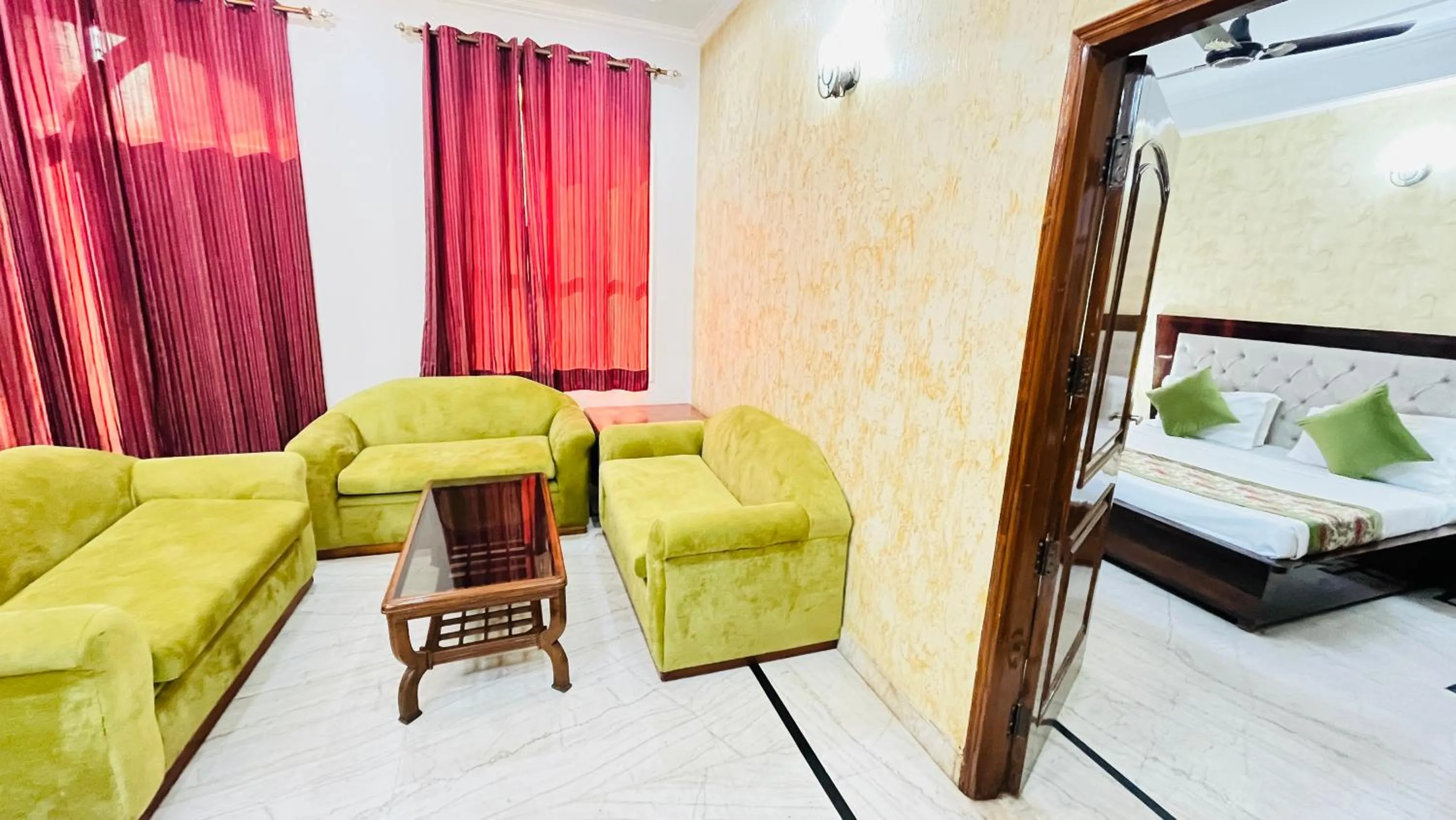 Seating area, Bed in Hotel Starline Sector 28