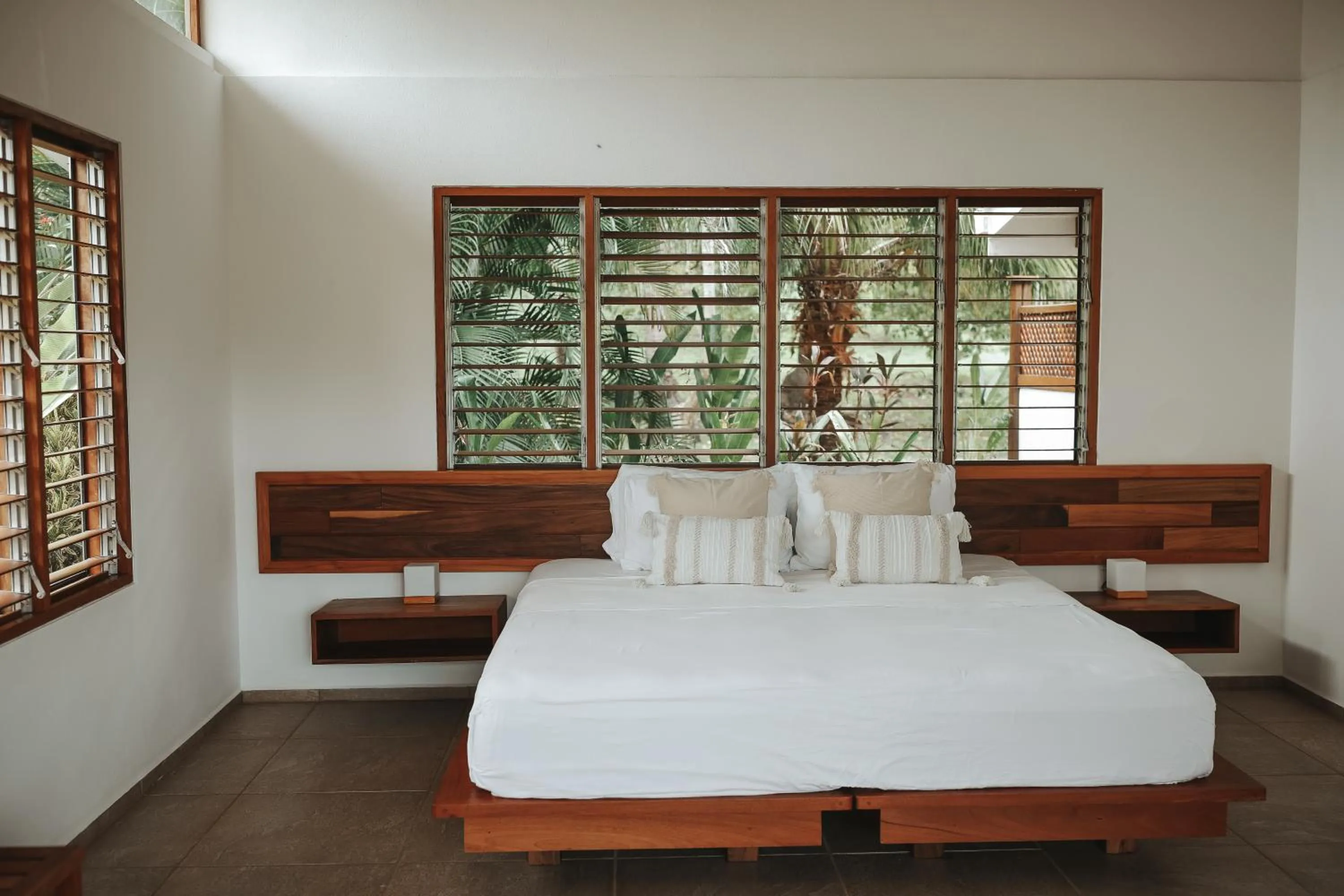 Bed in Salvatierra Beachfront Hotel