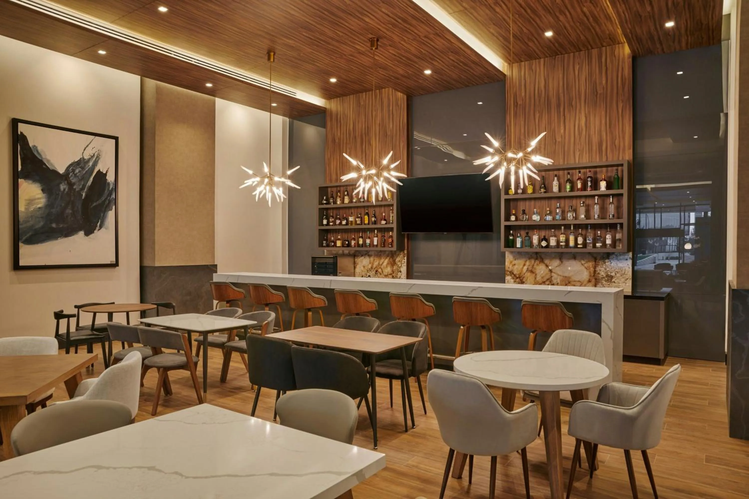 Lounge or bar in AC Hotel by Marriott Saltillo