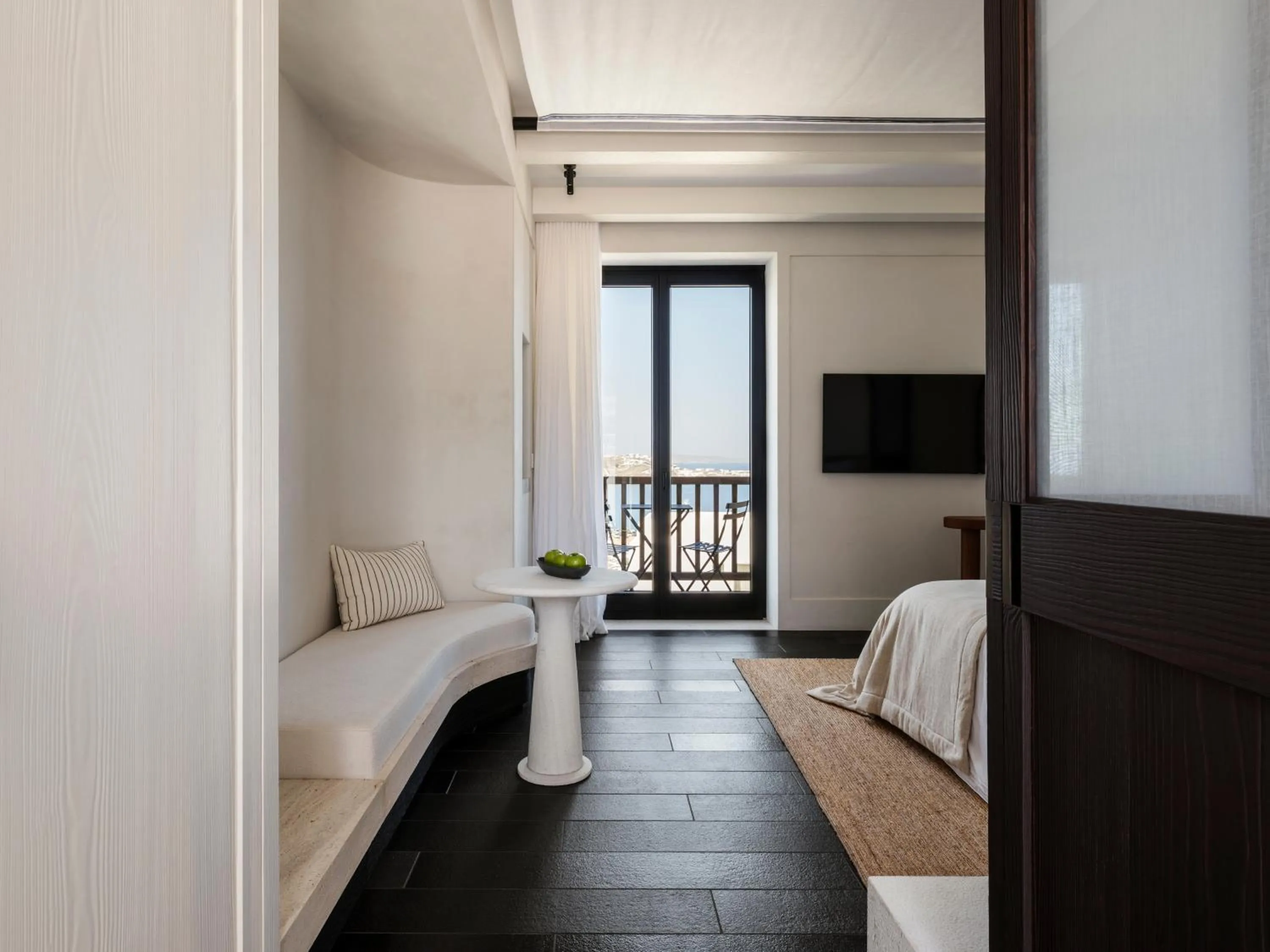 Seating area, Bed in Anandes Hotel