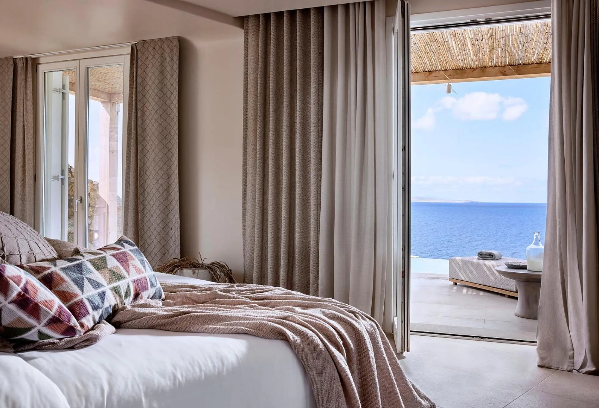 Bed in Amazon Mykonos Suites & Spa