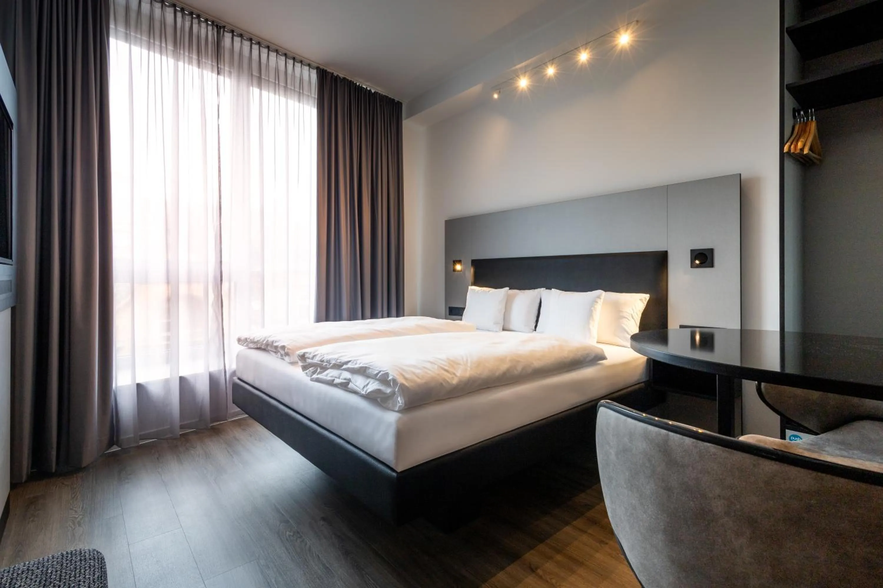 Photo of the whole room, Bed in GINN Apartment-Hotel Stuttgart-Esslingen