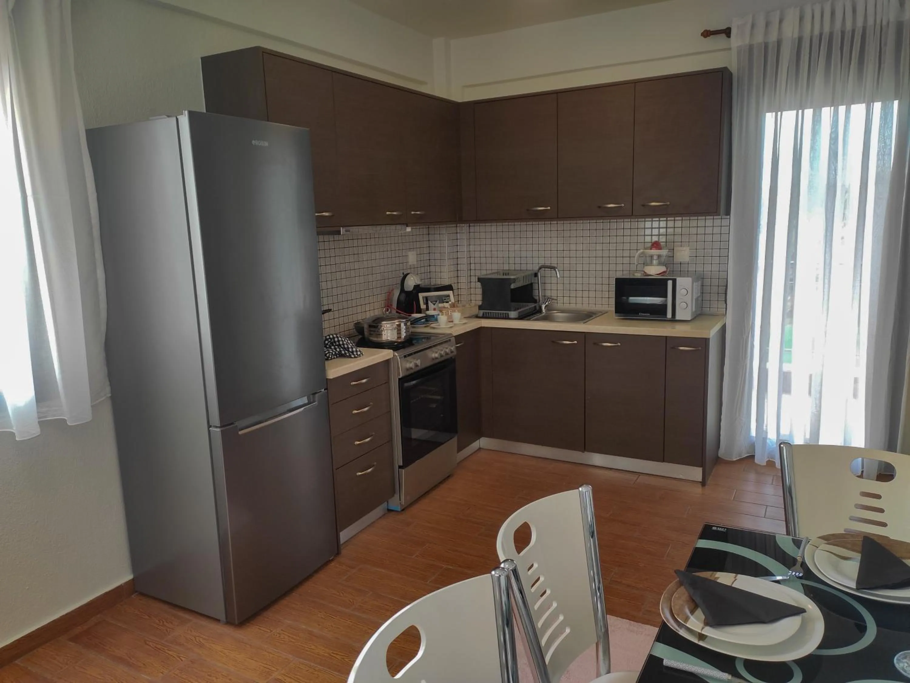 Kitchen or kitchenette in Kashmir Luxury Apartments