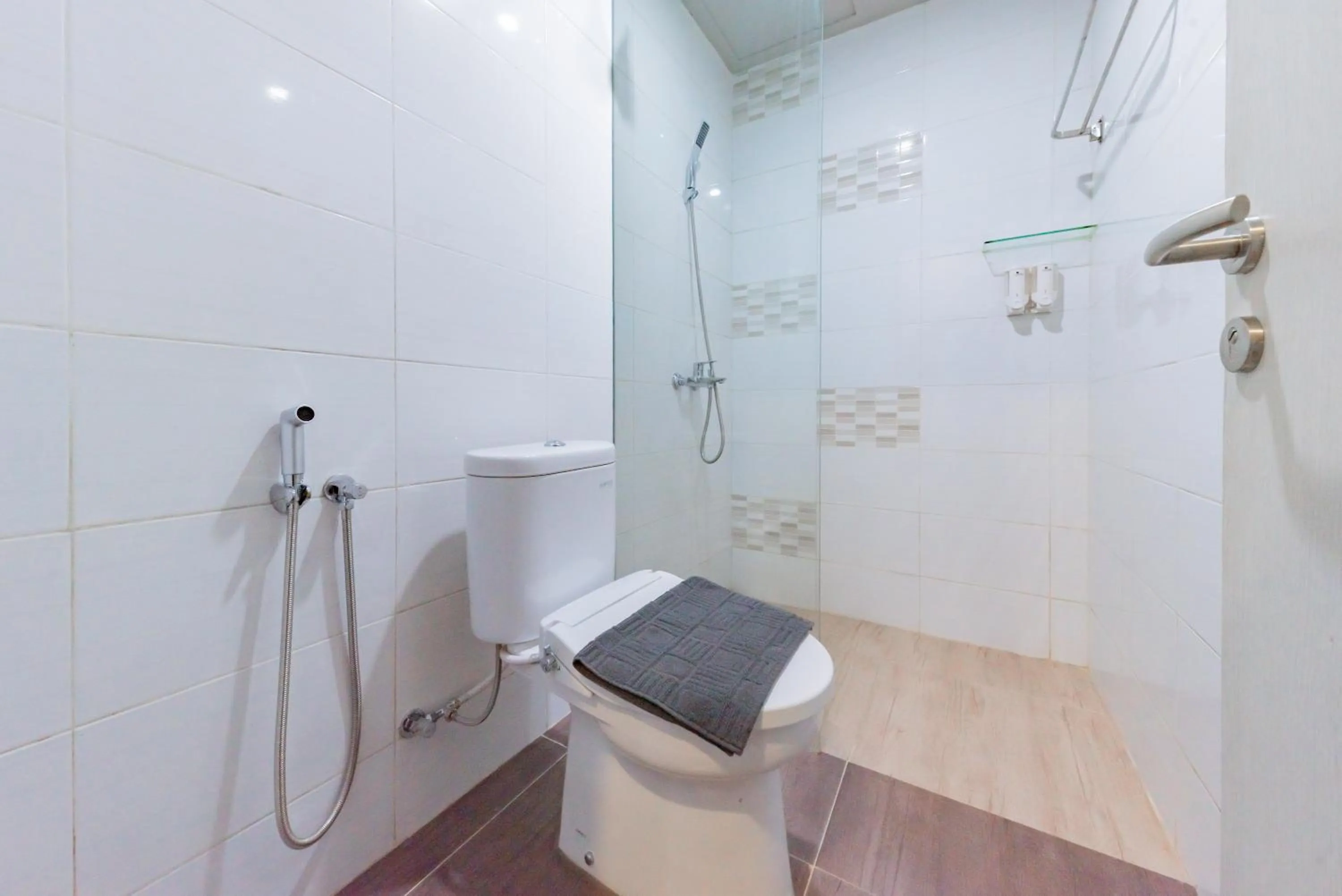 Bathroom in Sans Hotel Berau Square