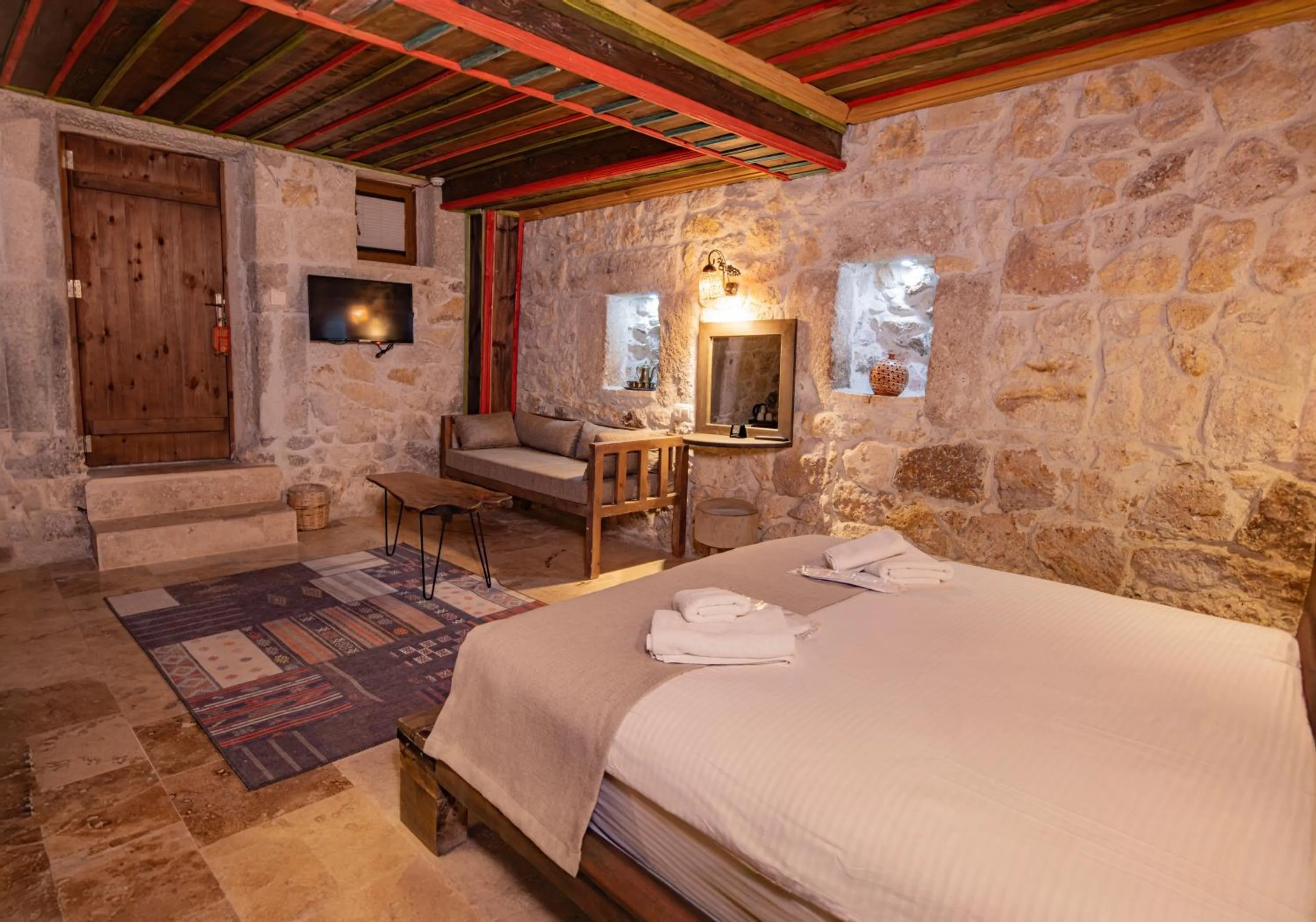 Seating area, Bed in Casa Di Cappadocia