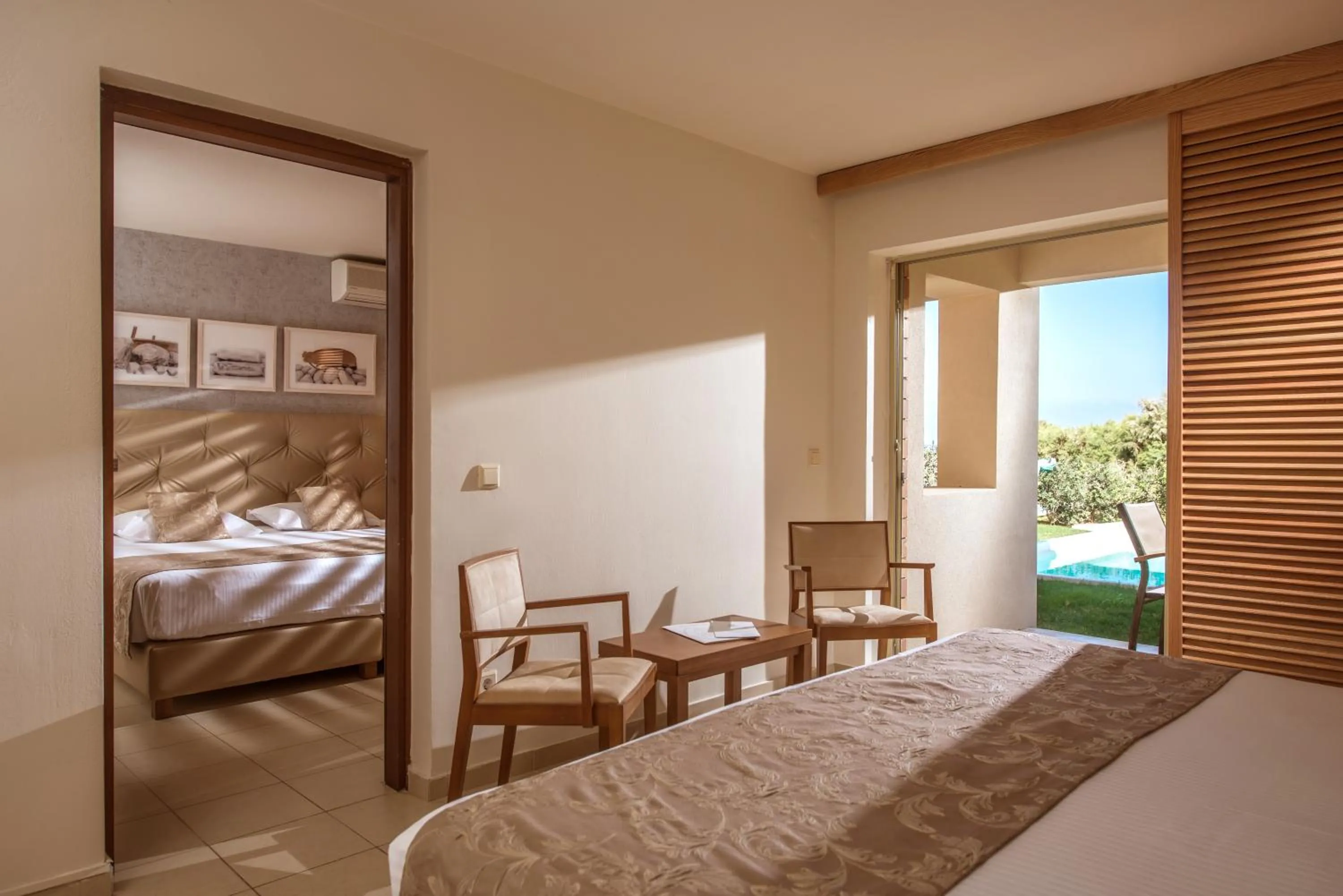 Living room, Bed in Bella Beach Hotel