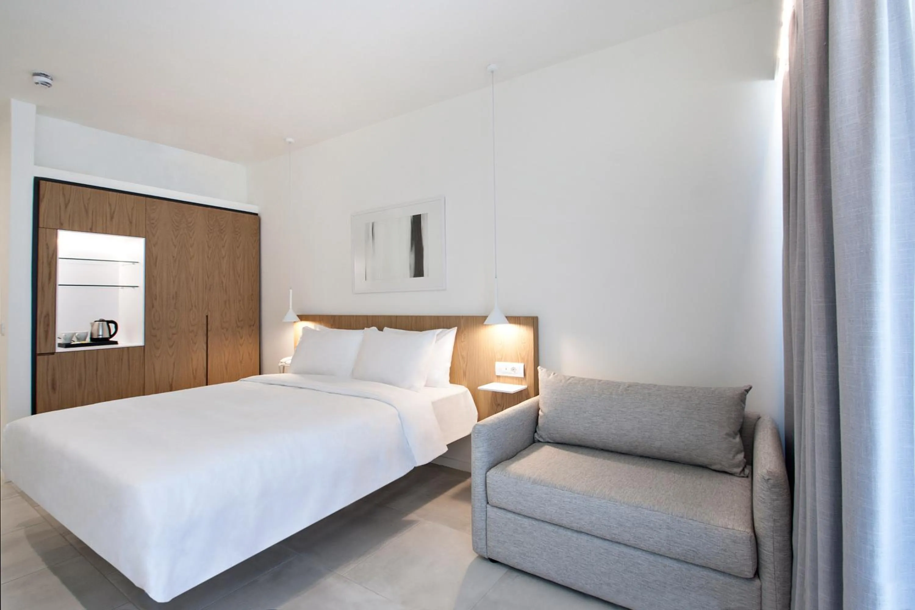 Photo of the whole room, Bed in Radisson Resort Plaza Skiathos