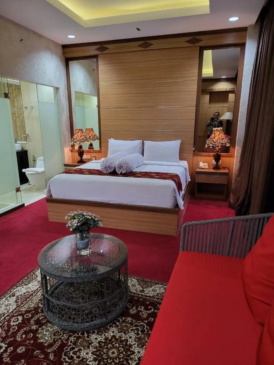 Bed in Grand Buana Lestari Hotel