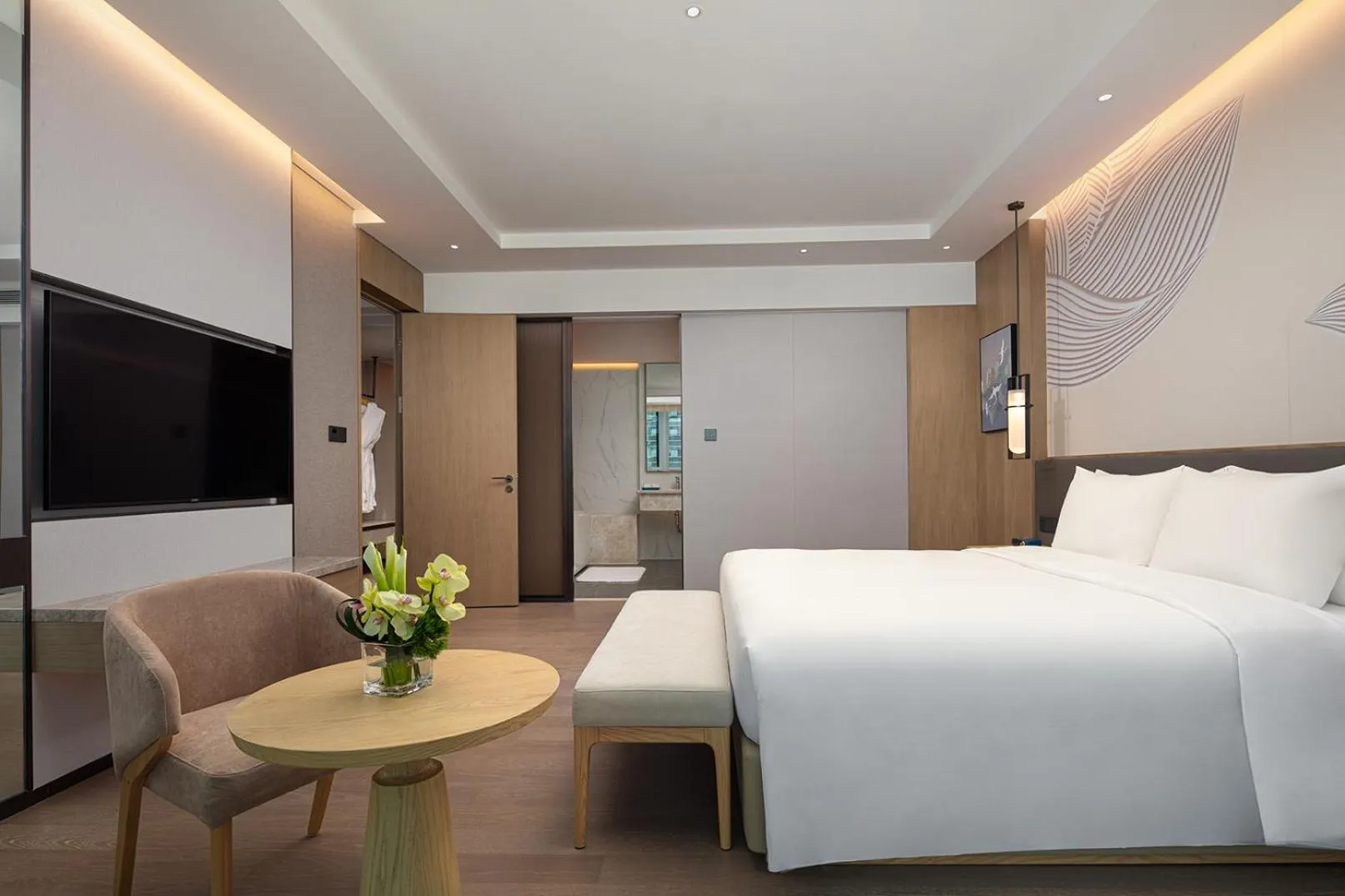 Bed in Wyndham Guangzhou Baiyun Mountain