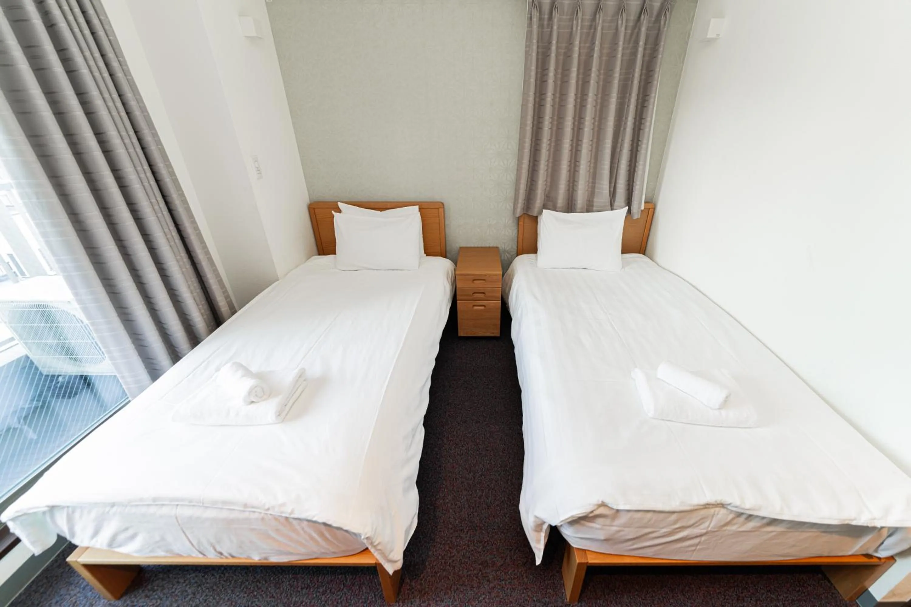 Bed in Serorin Light Hotel Tokyo