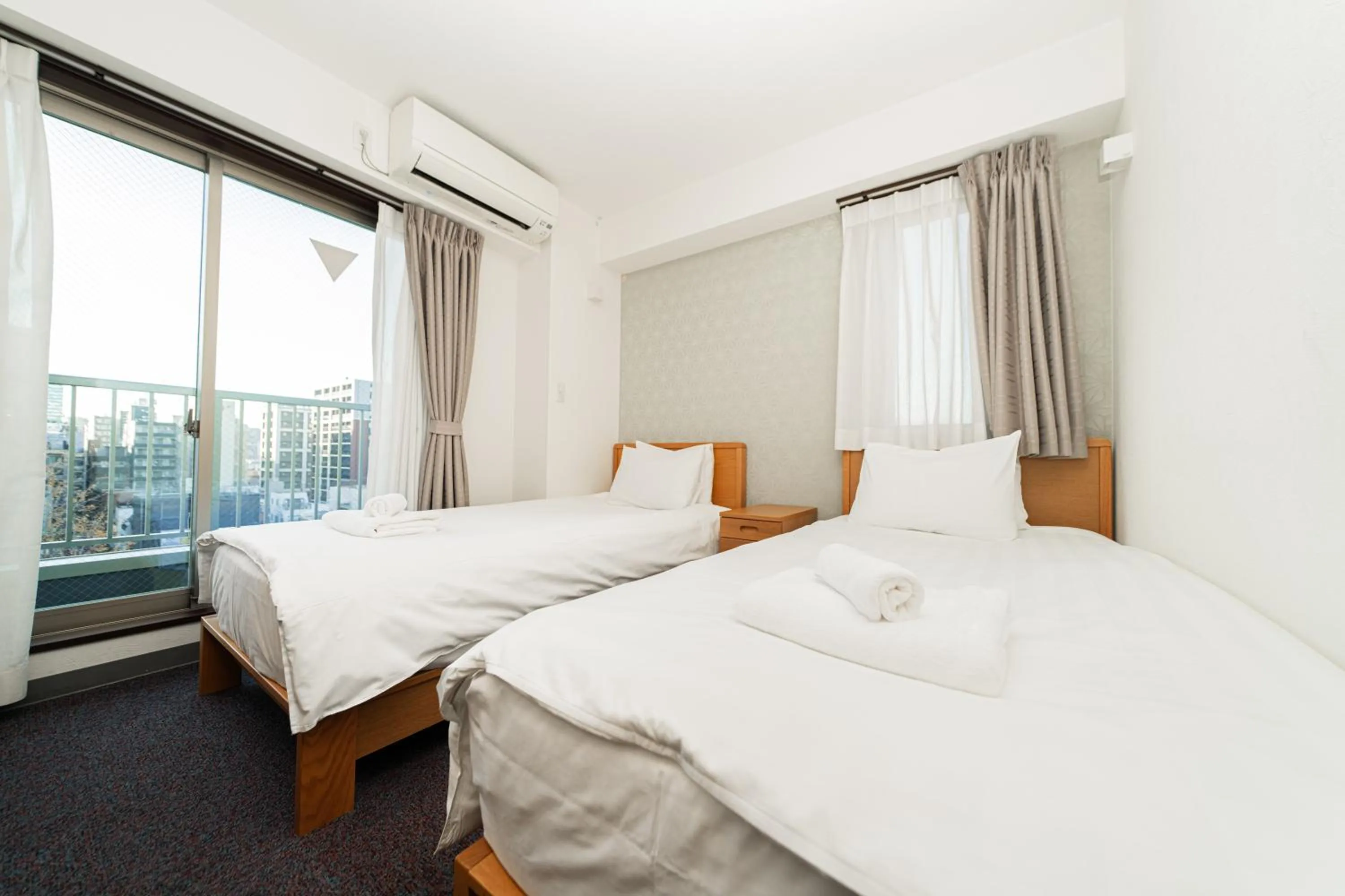 Bed in Serorin Light Hotel Tokyo