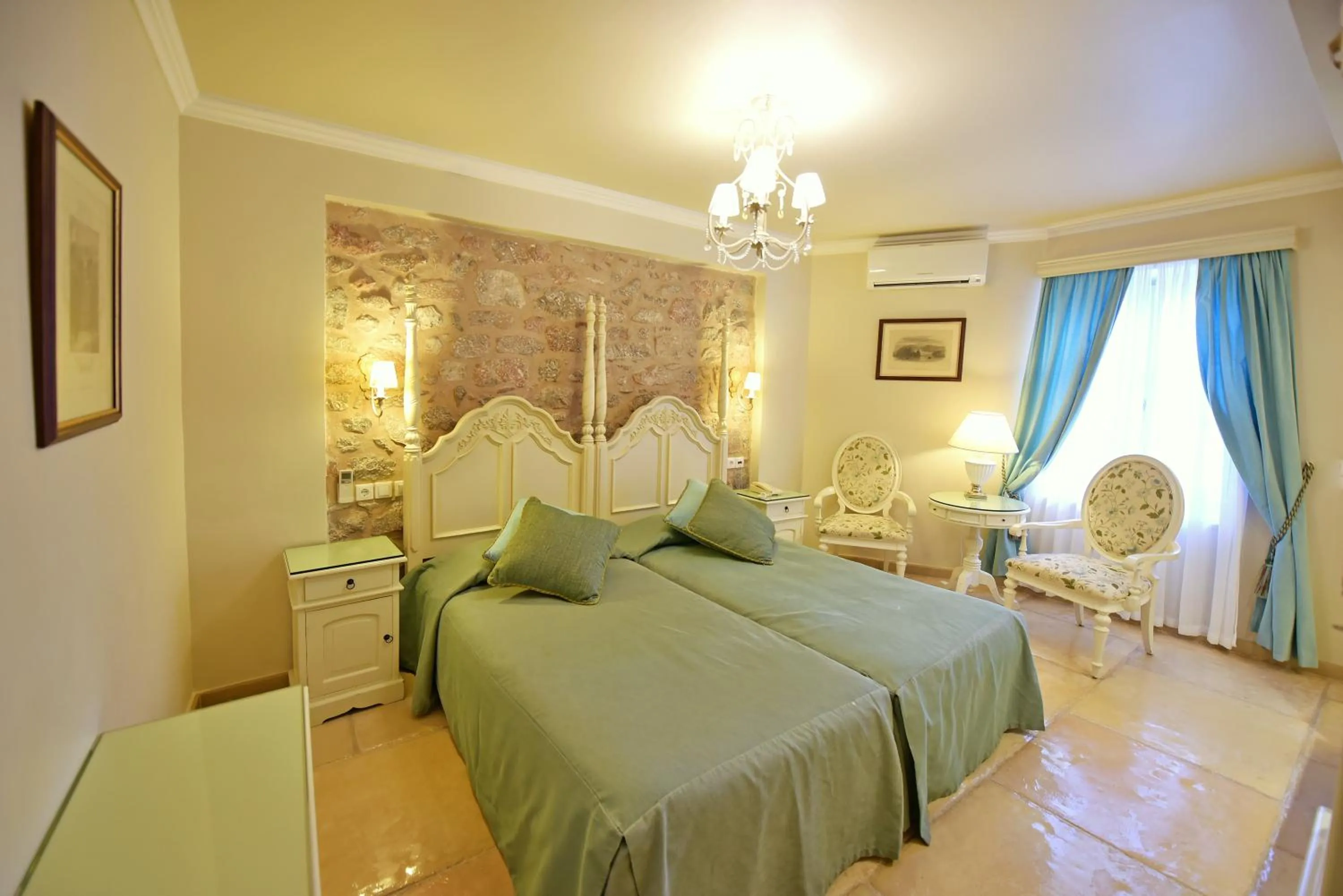 Bed in Angelica Traditional Boutique Hotel