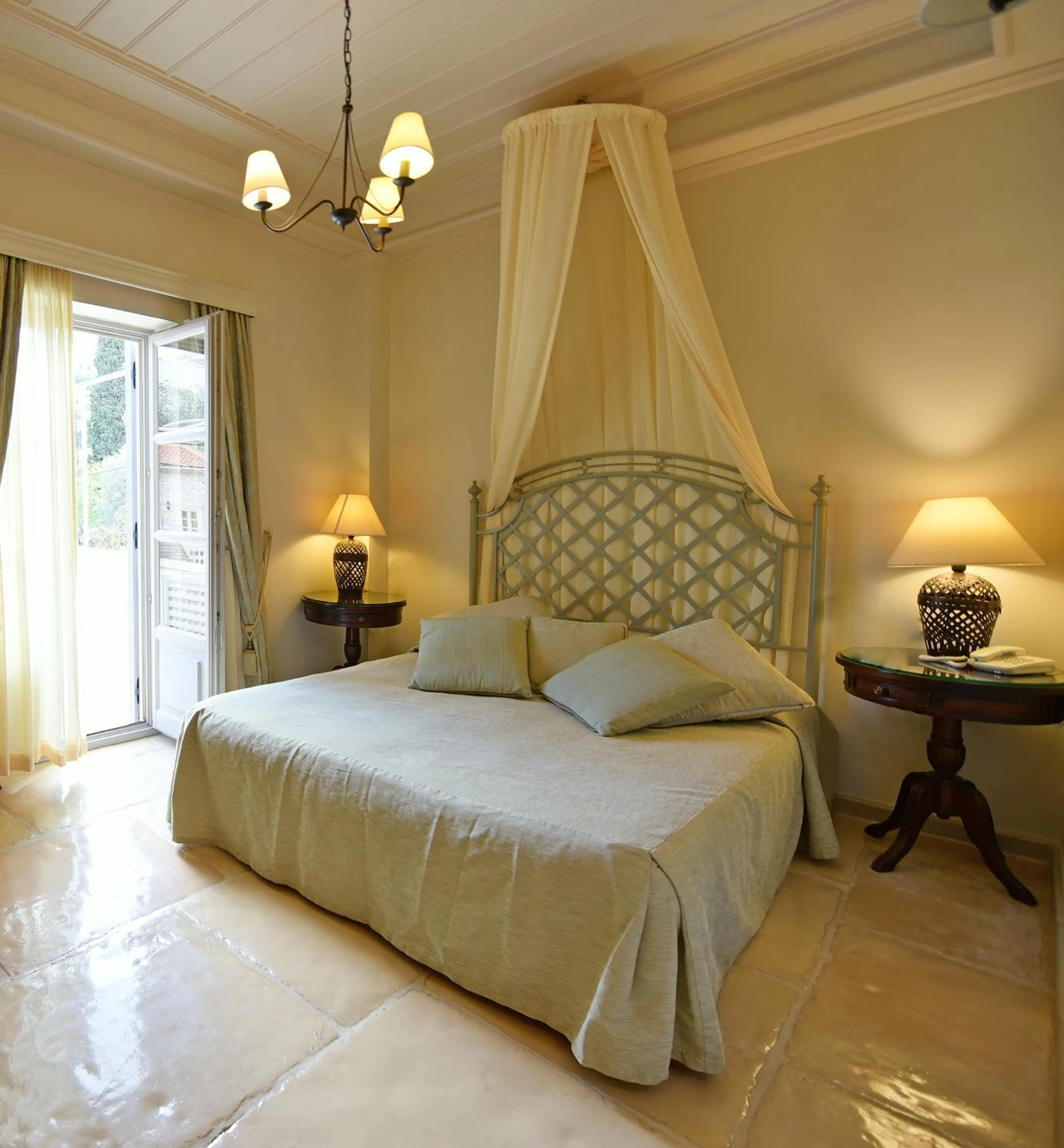 Bed in Angelica Traditional Boutique Hotel