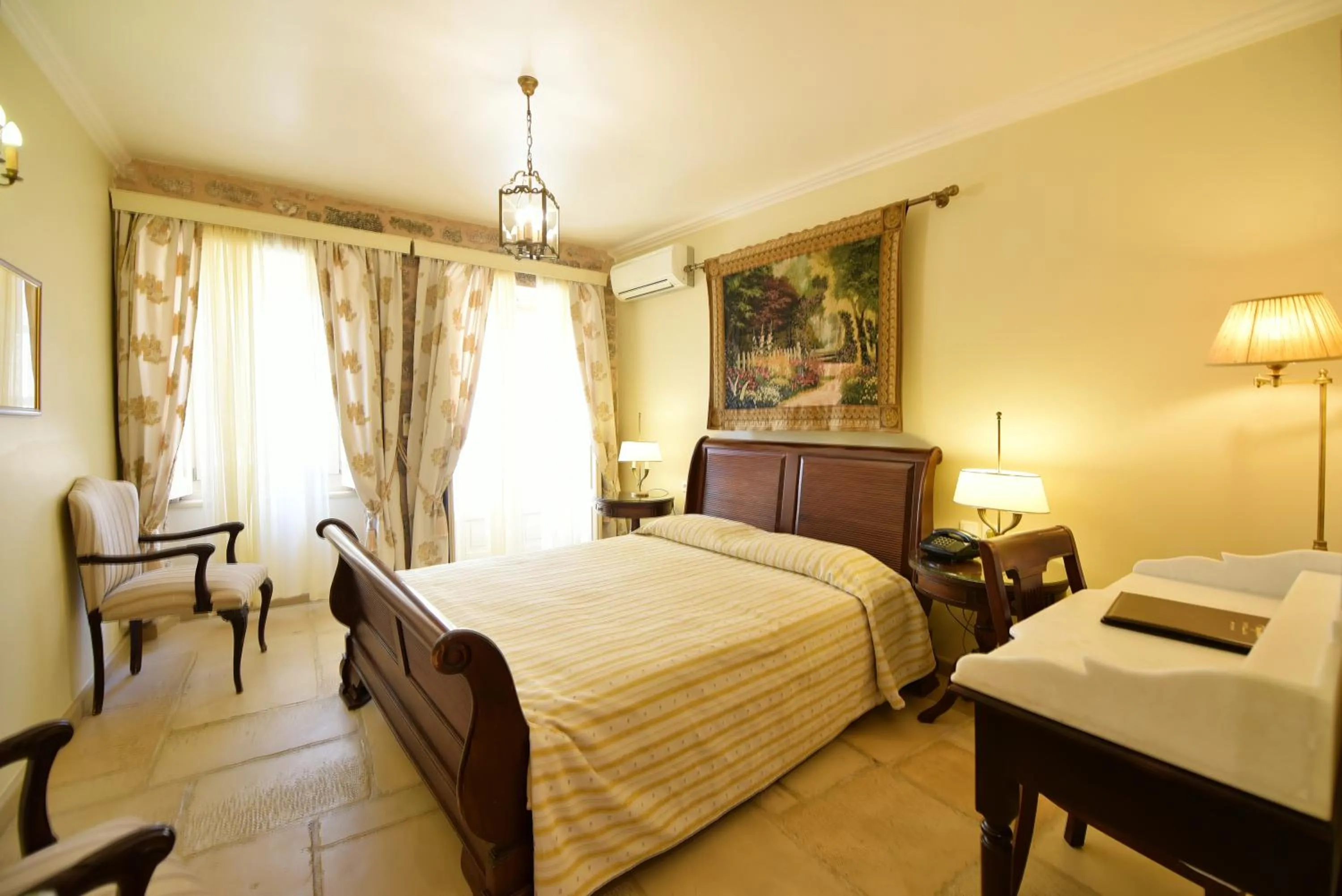 Bed in Angelica Traditional Boutique Hotel