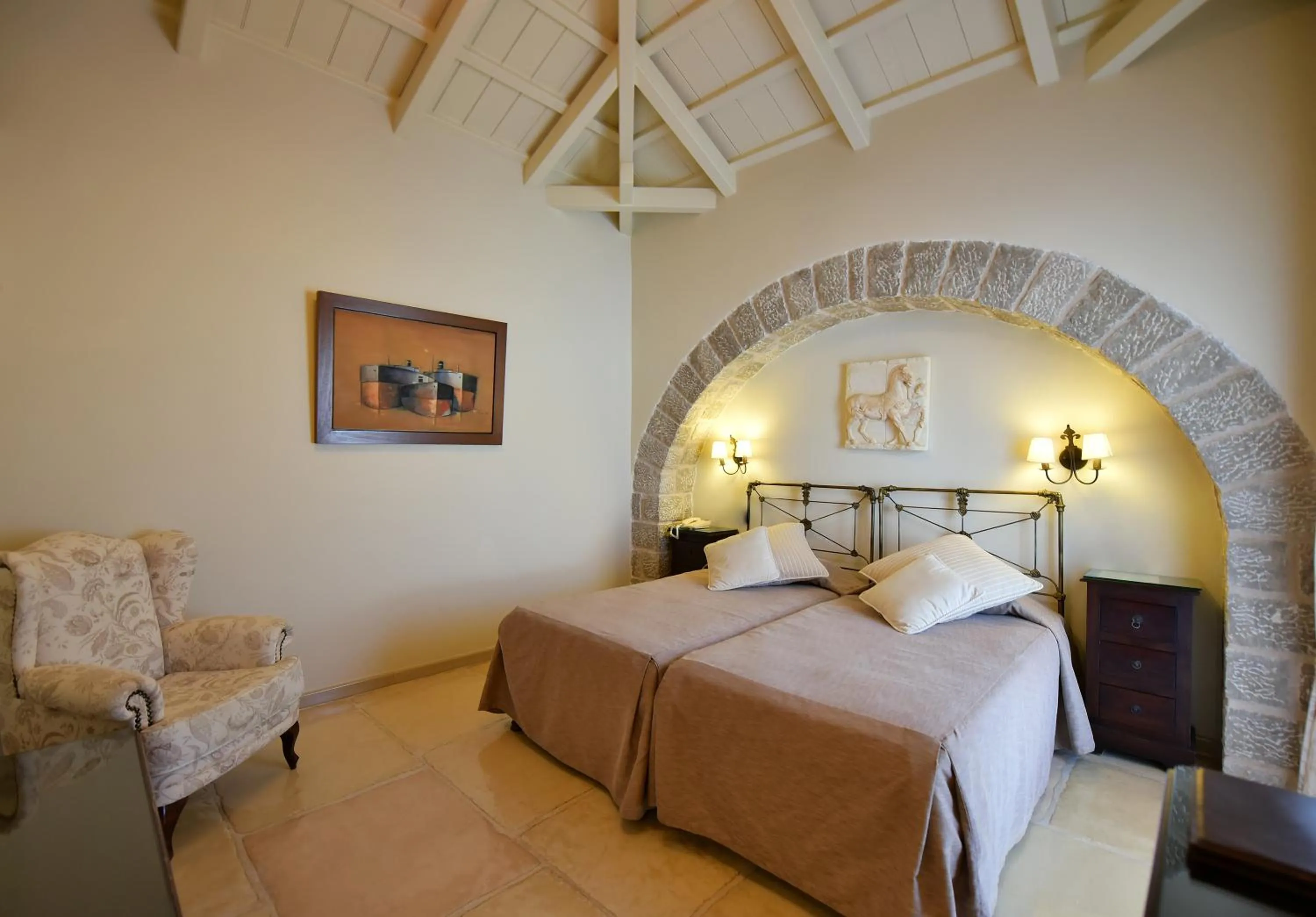 Bed in Angelica Traditional Boutique Hotel