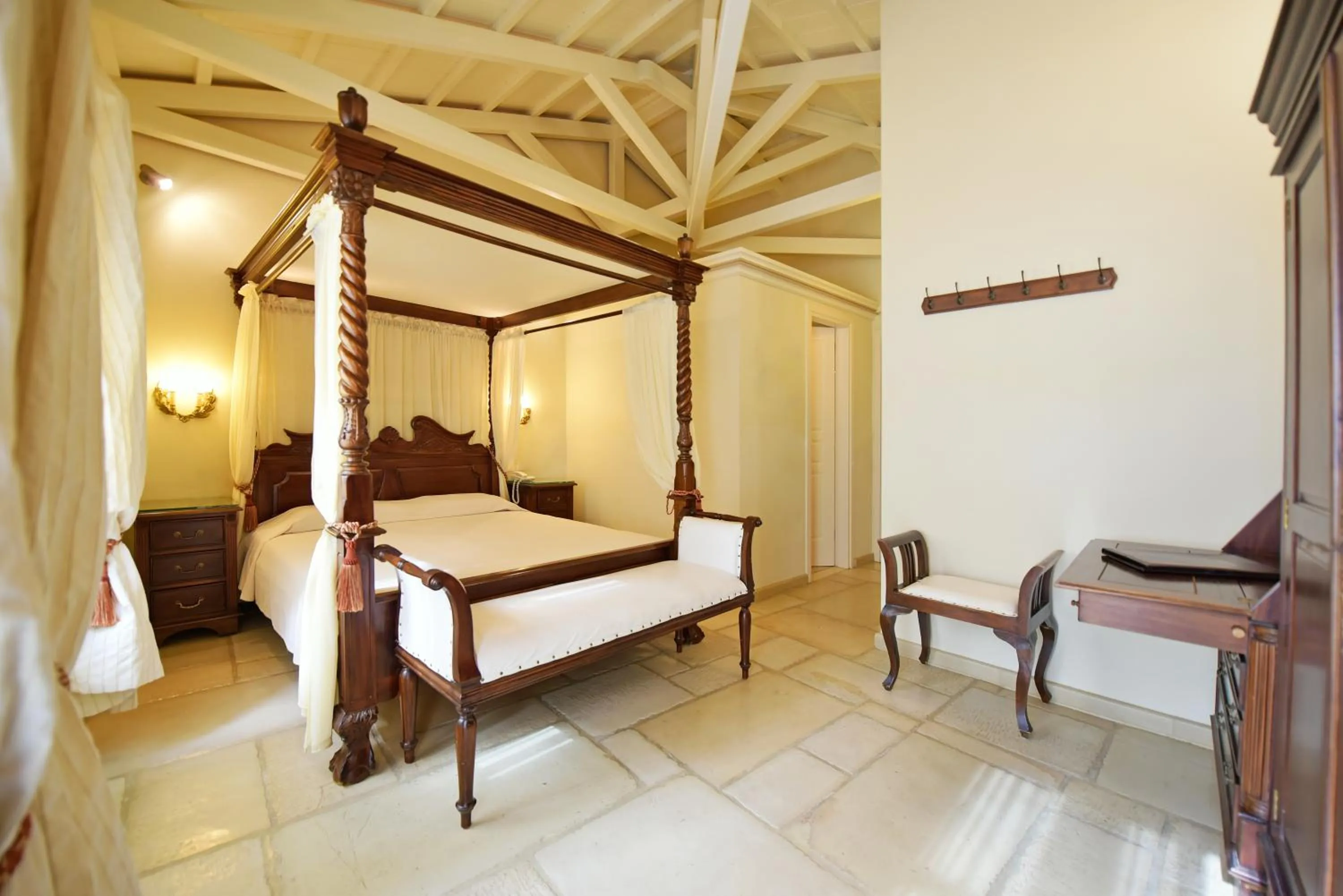 Bed in Angelica Traditional Boutique Hotel