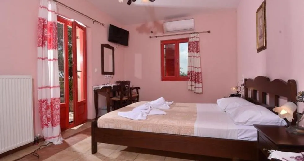 Bed in Arolithos Traditional Village Hotel