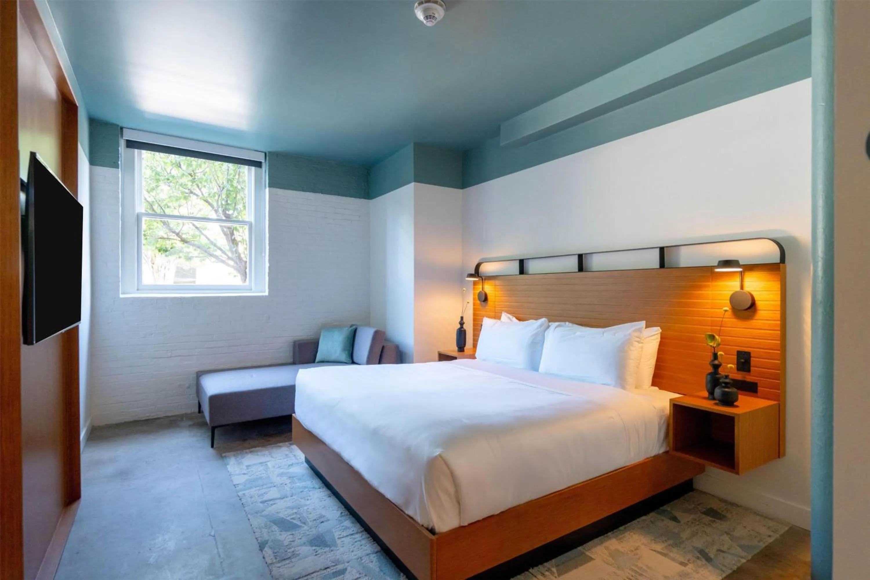 Bed in The Myriad Hotel Louisville, Tapestry Collection by Hilton