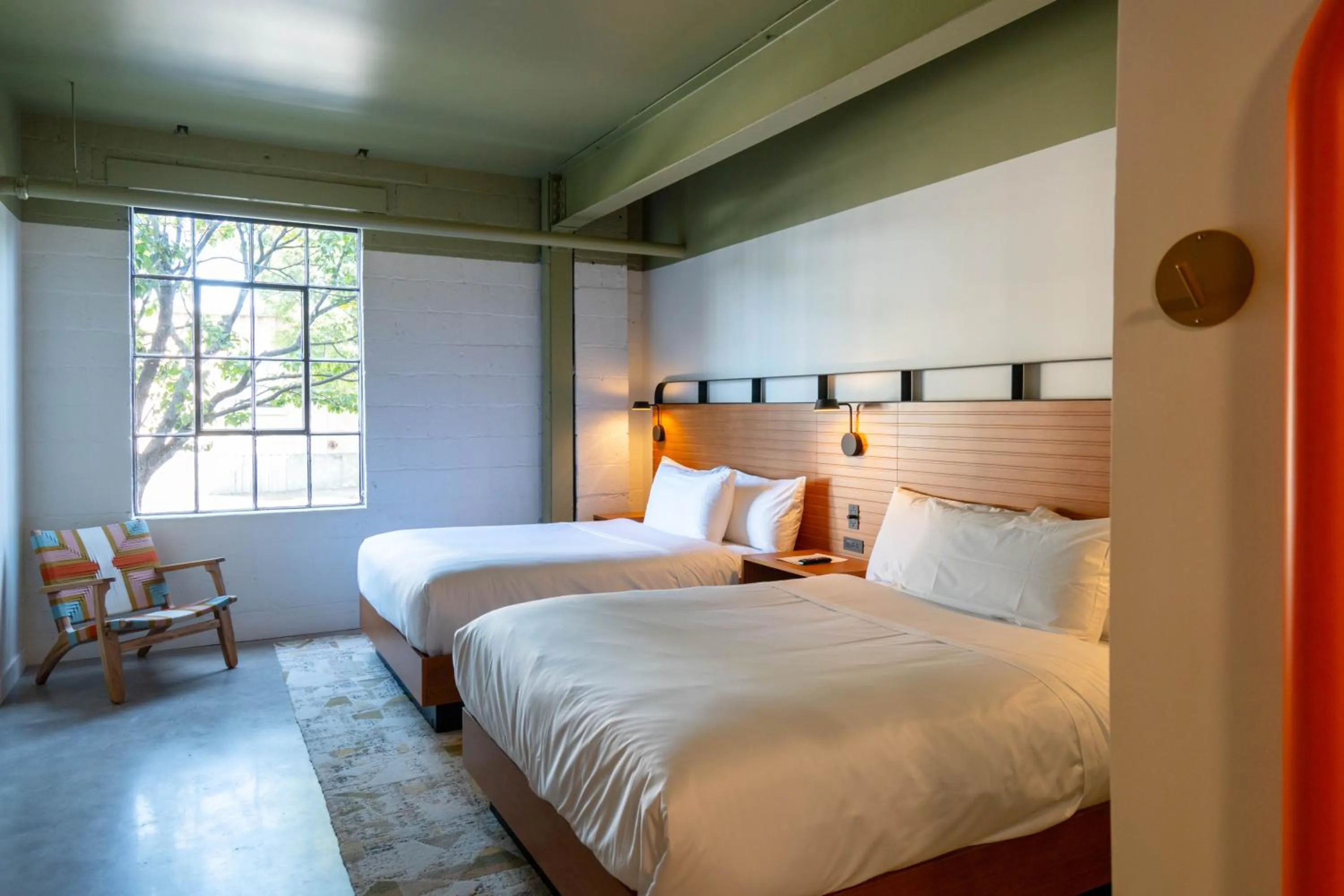 Bed in The Myriad Hotel Louisville, Tapestry Collection by Hilton