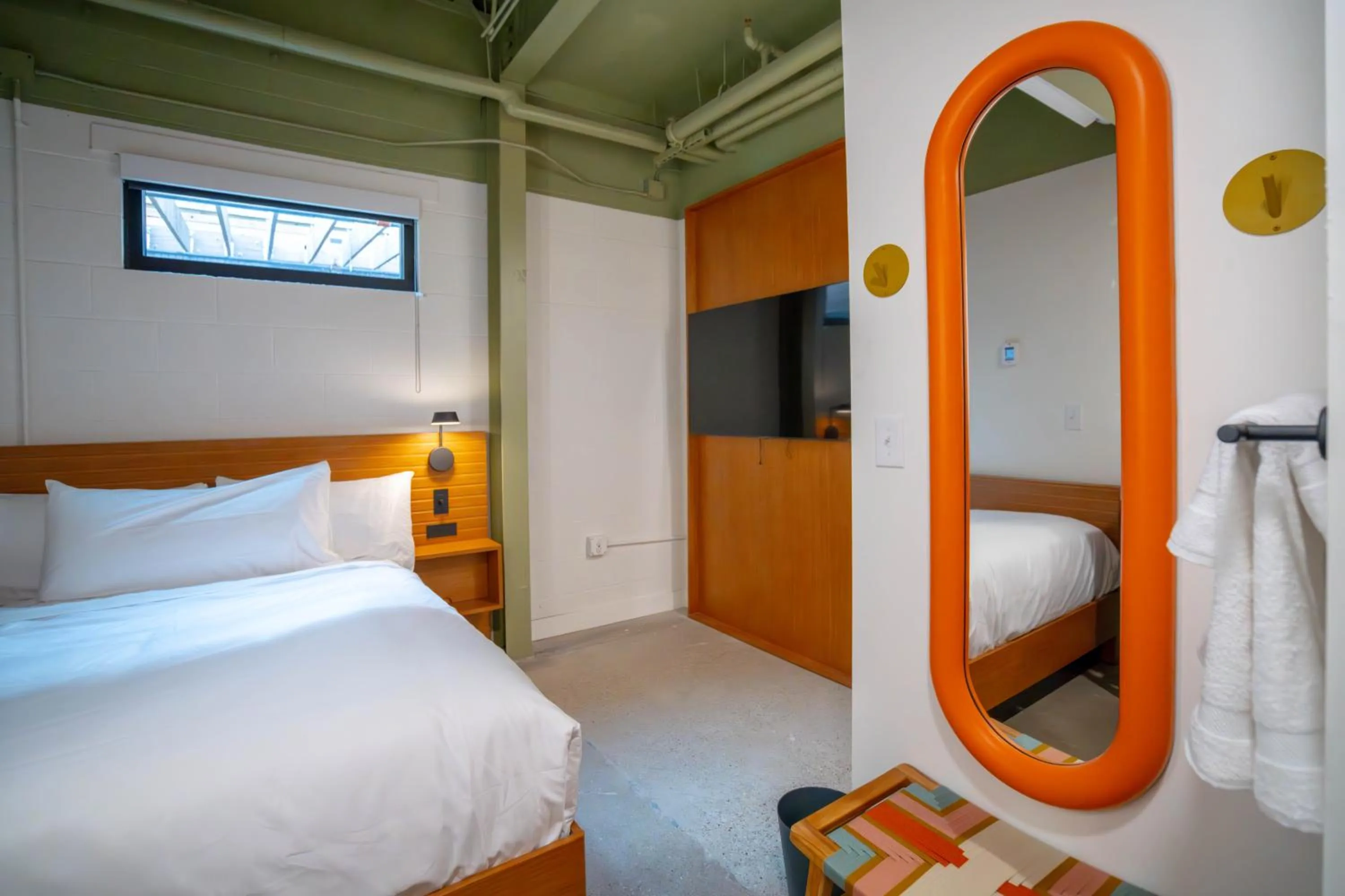 Bed in The Myriad Hotel Louisville, Tapestry Collection by Hilton